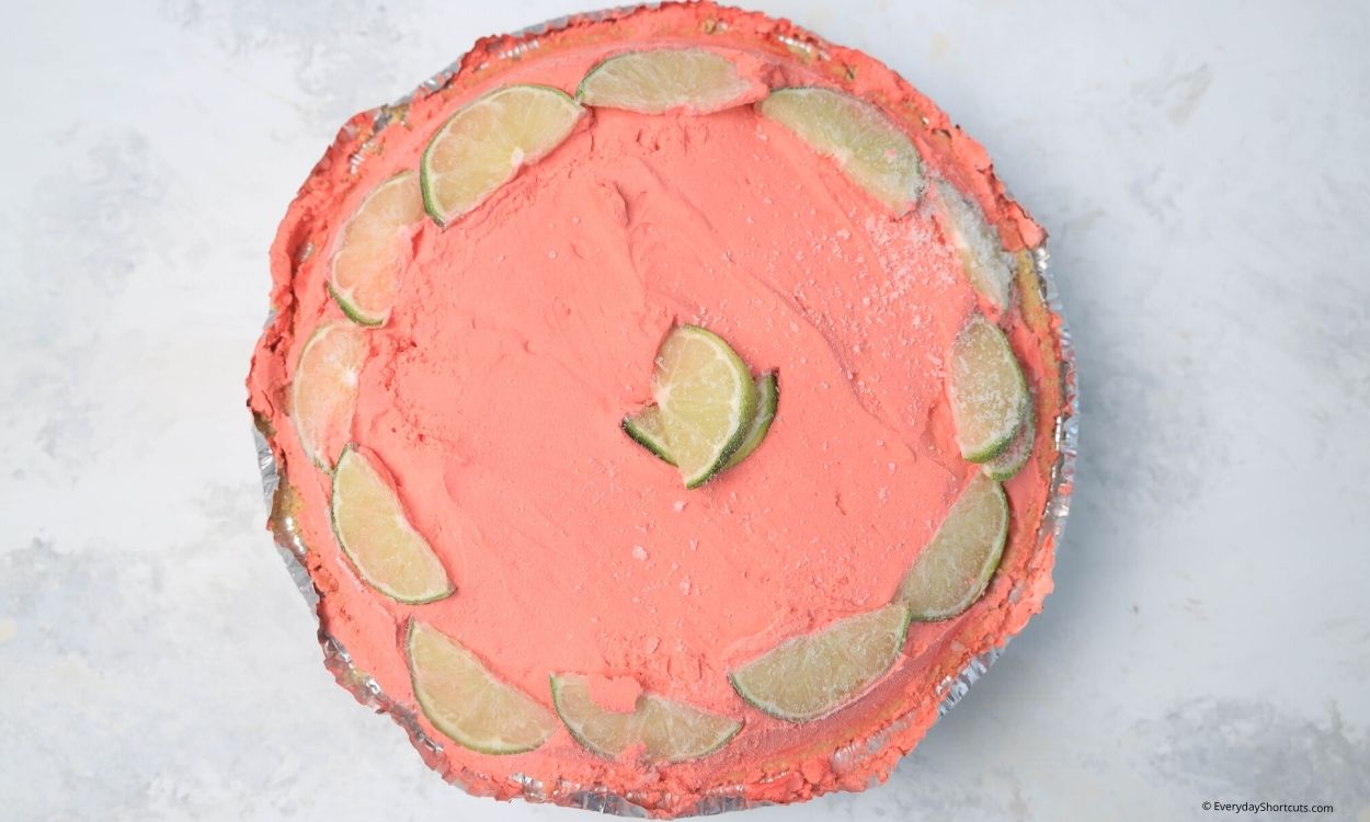 Garnish kool aid pie with lime slices