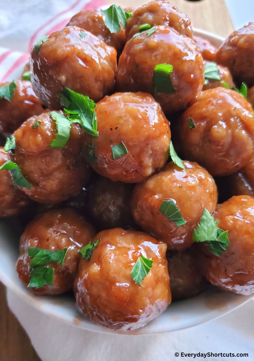grape jelly meatballs with bbq sauce in a bowl