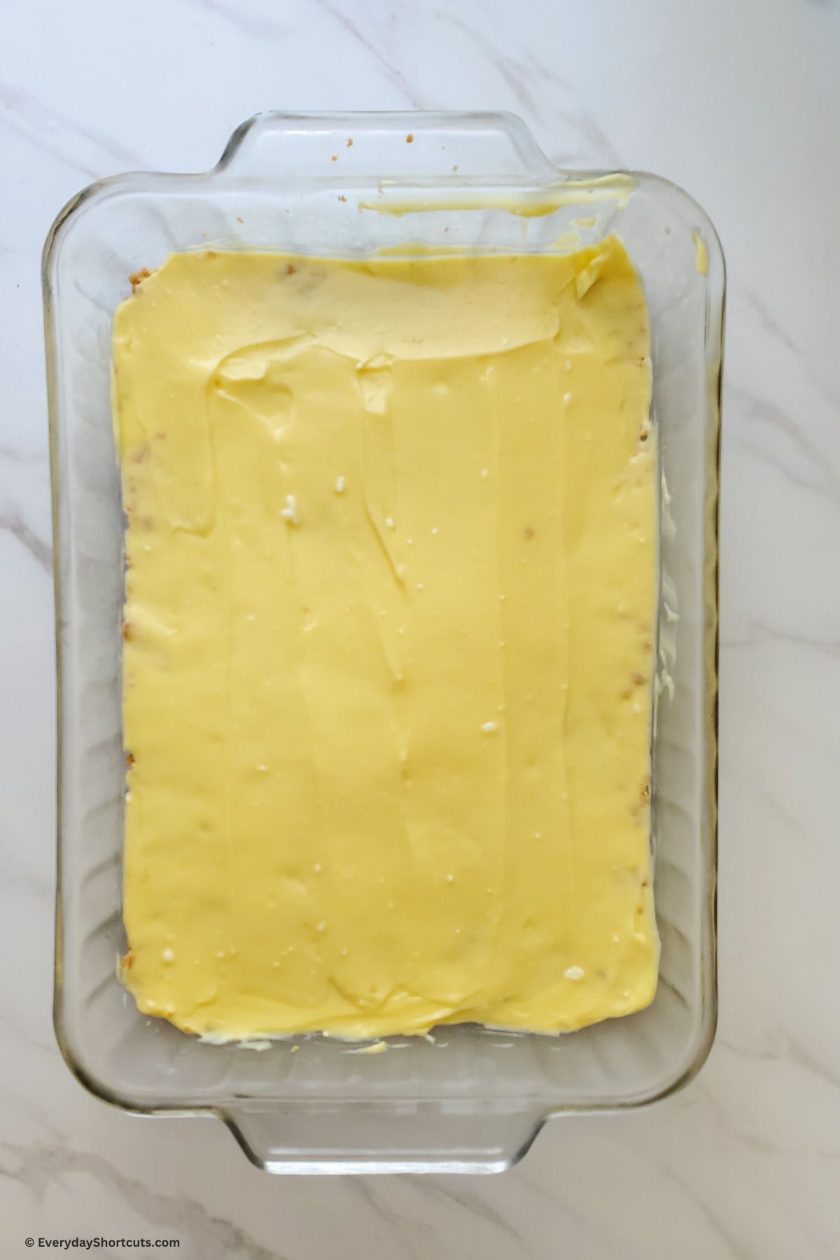 creamy pudding layer in a a baking dish