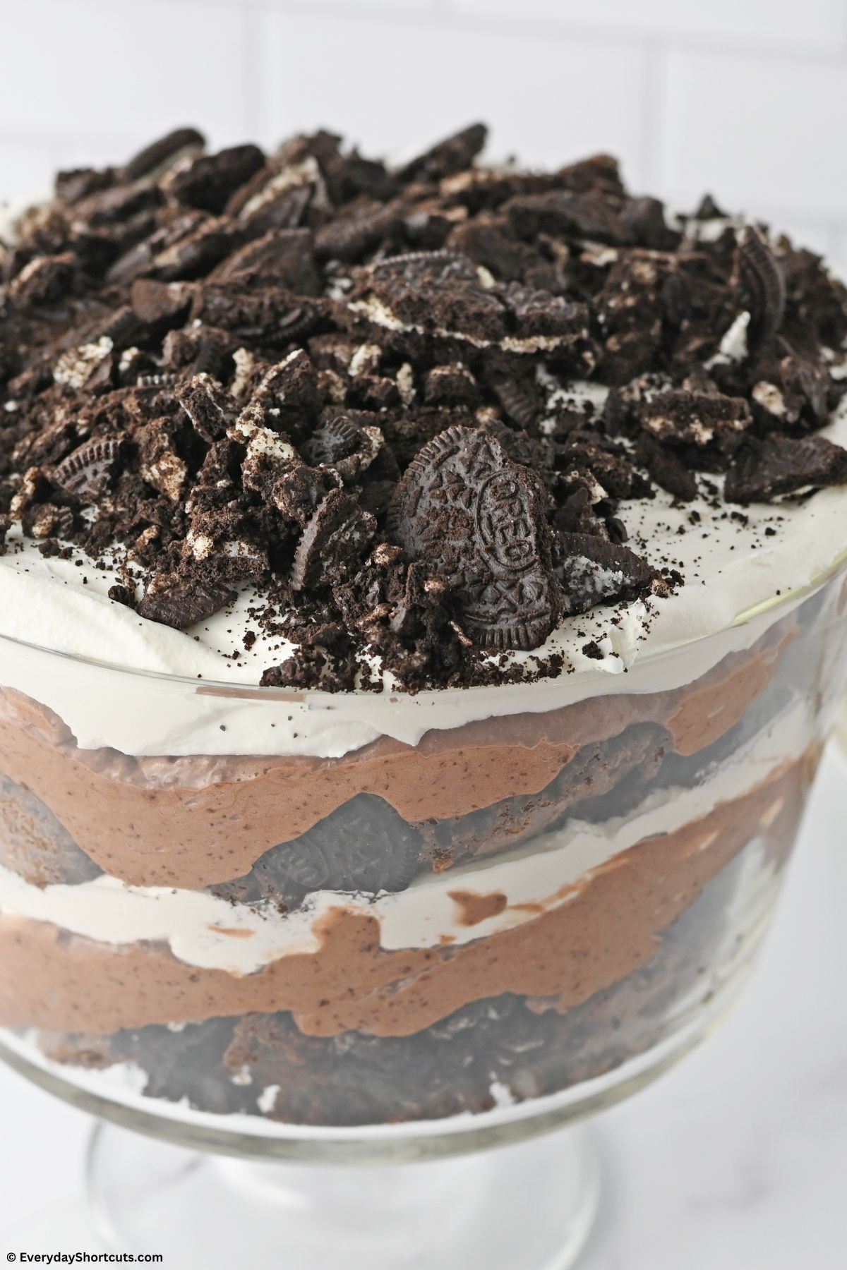 crushed oreos on top of trifle dessert