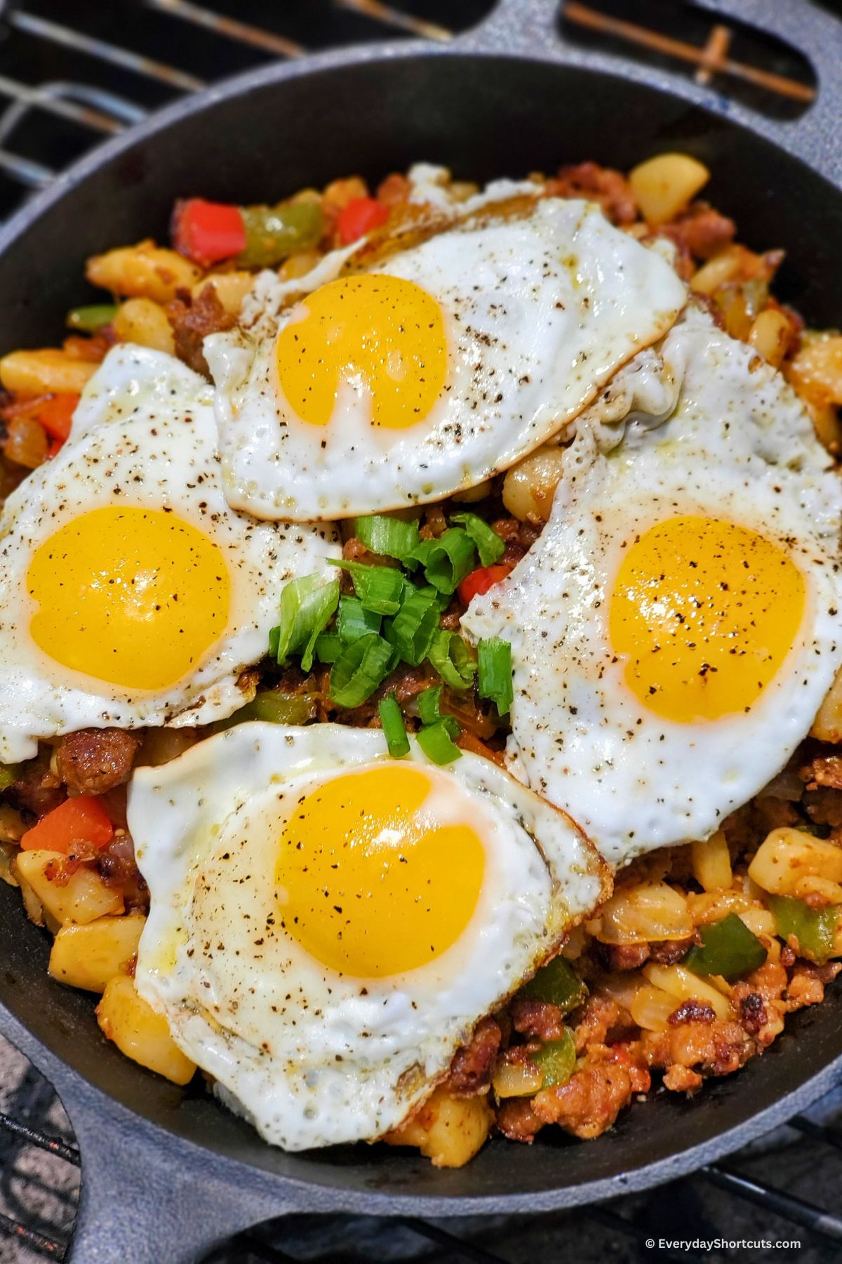 campfire hash with eggs on top