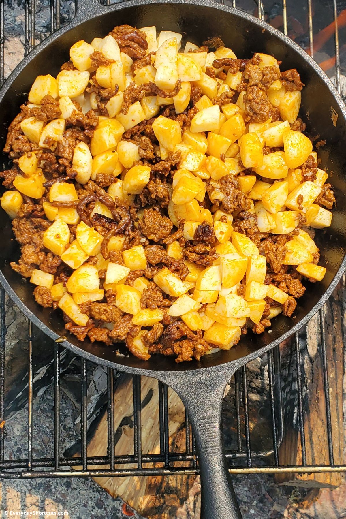 cooked potatoes and chorizo in a skillet