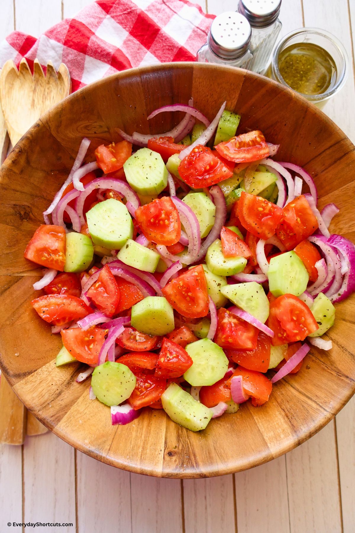 cucumber tomato and onion salad in a bowl