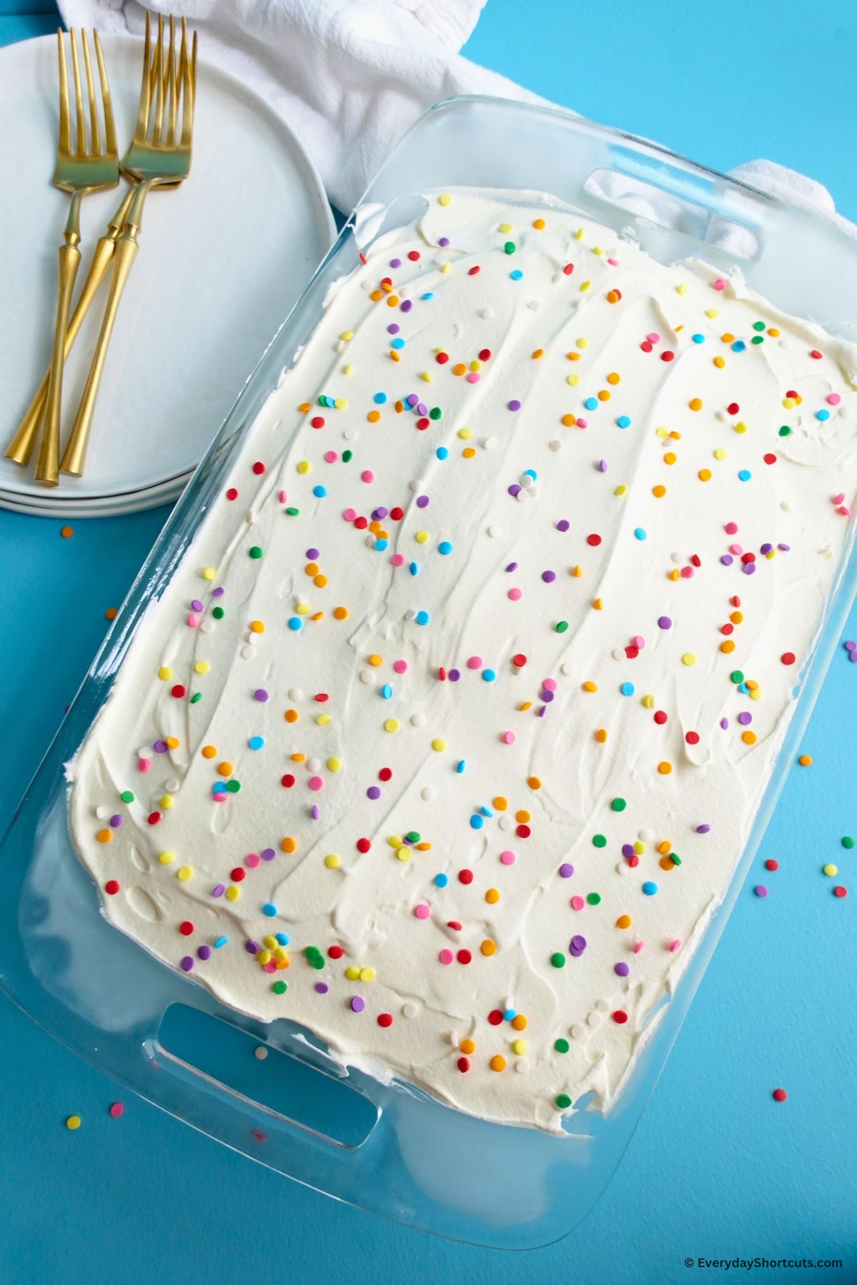 rainbow sprinkles on top of cake