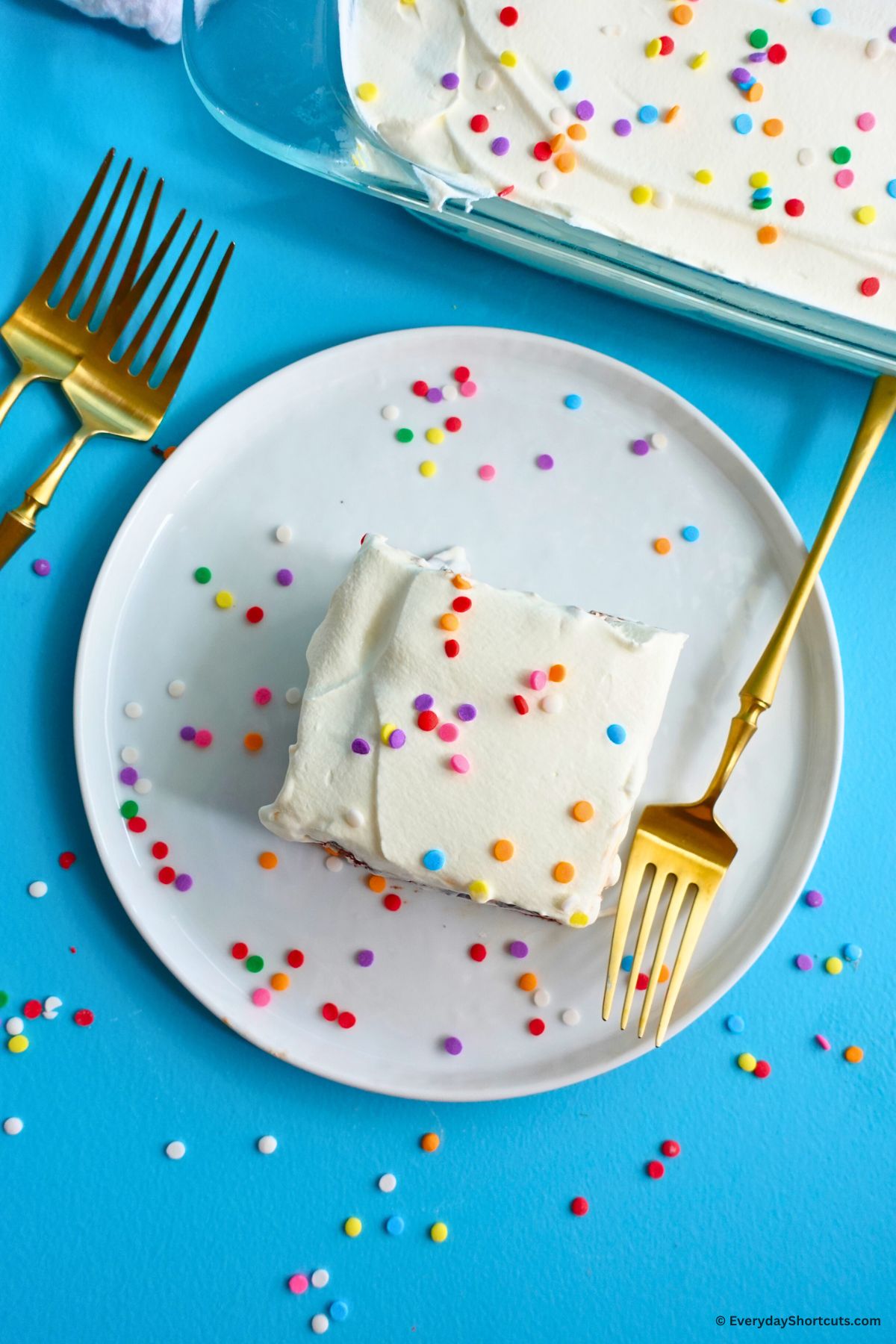 ice cream sandwich cake with whipped topping and sprinkles