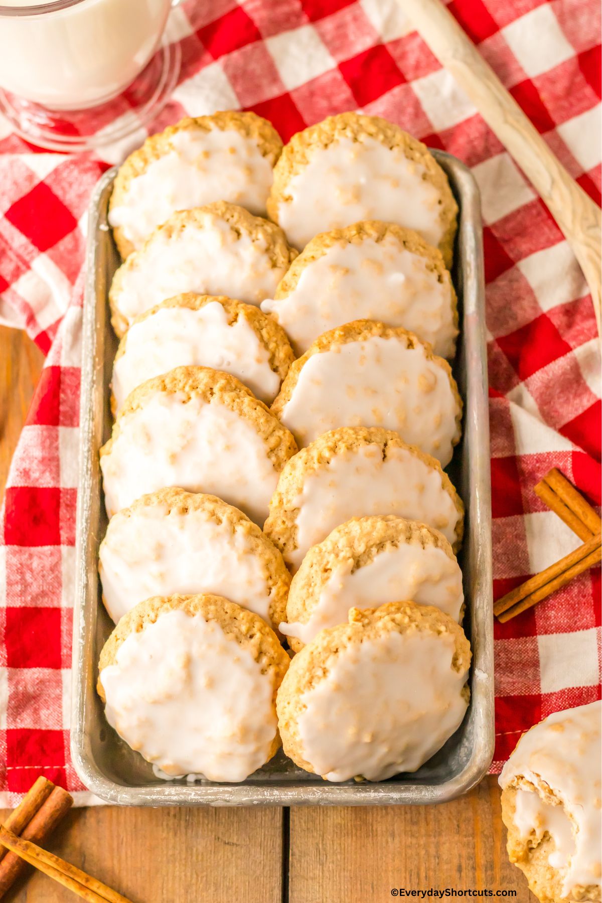 oatmeal cookies with icing on a baking sheet