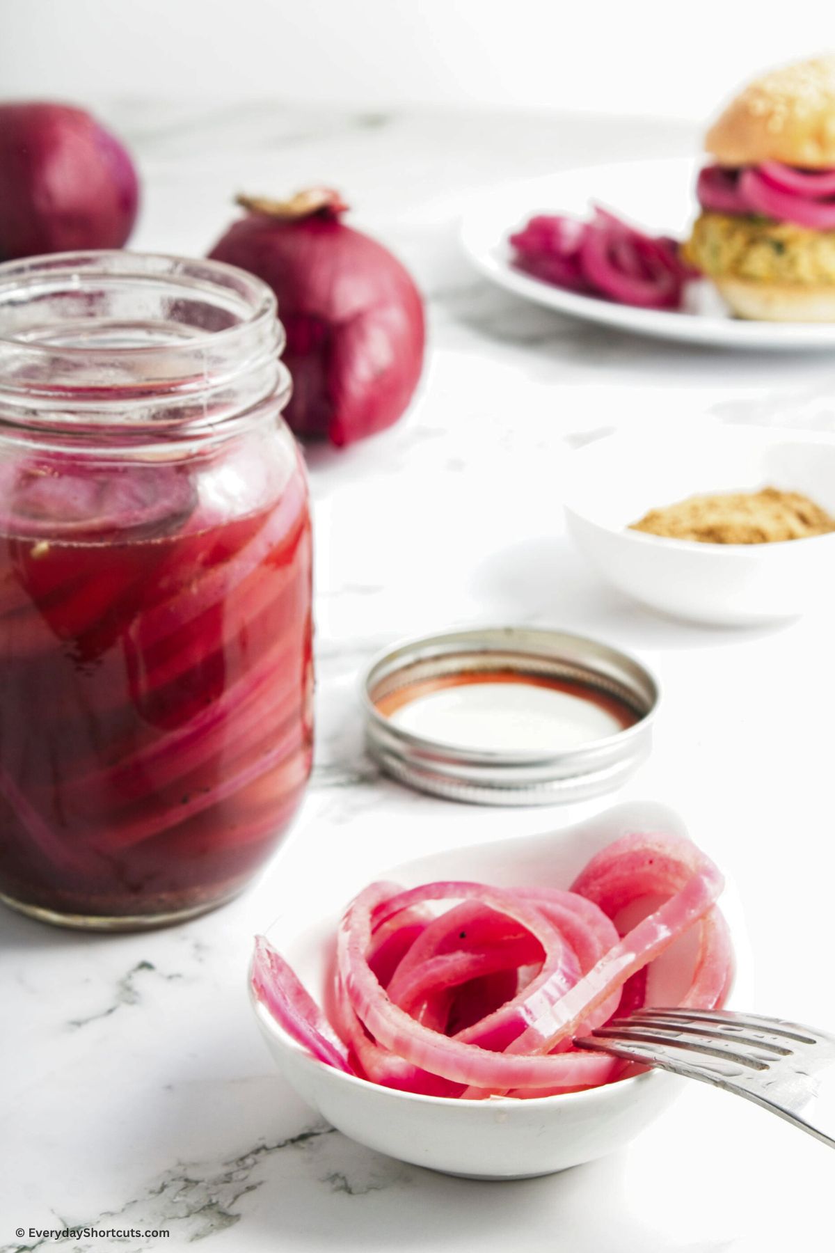 pickled red onions in a bowl