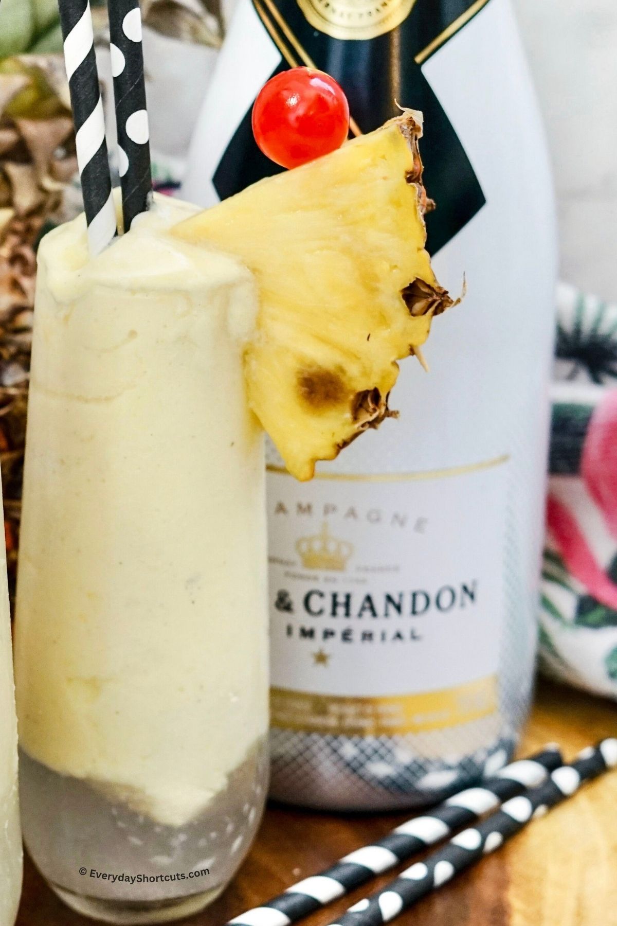 pineapple champagne cocktail in a champagne flute