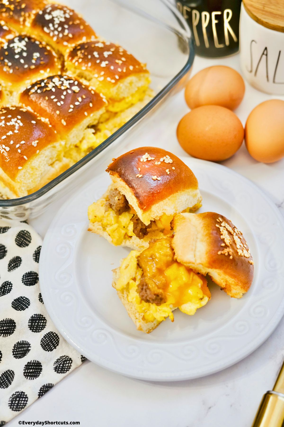 Hawaiian Roll Breakfast Sliders in a pan and on a plate