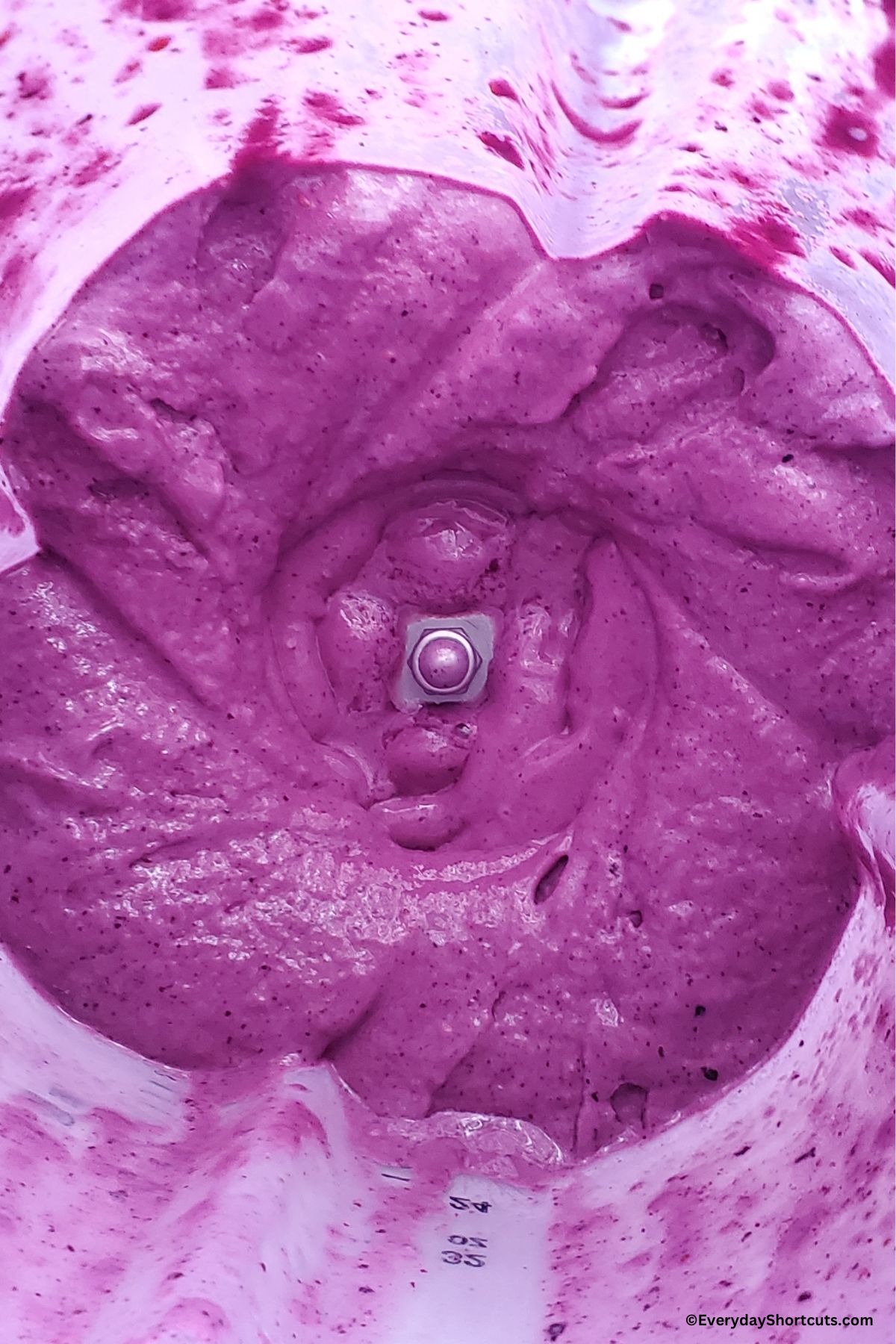 blended purple milkshake in a blender