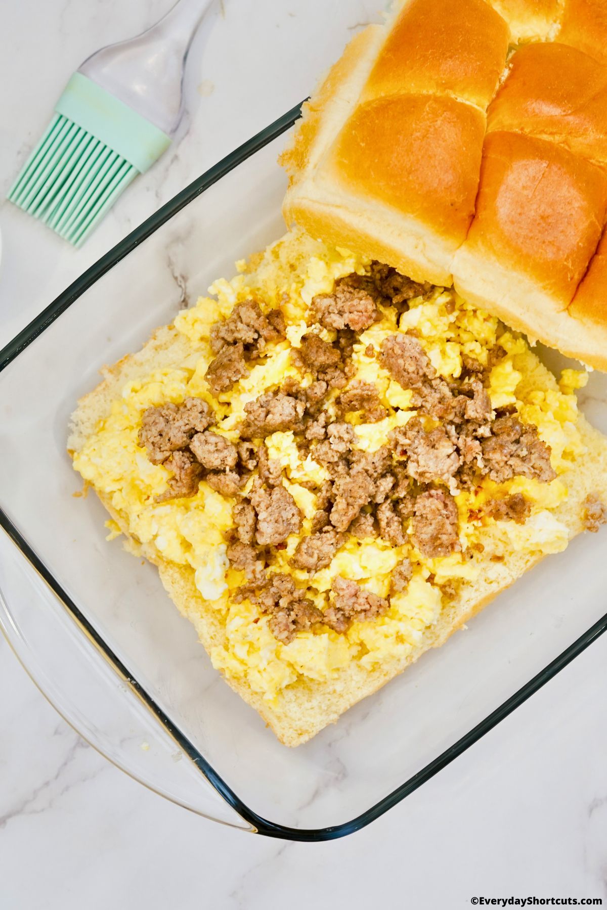 scrambled eggs and sausage on buns