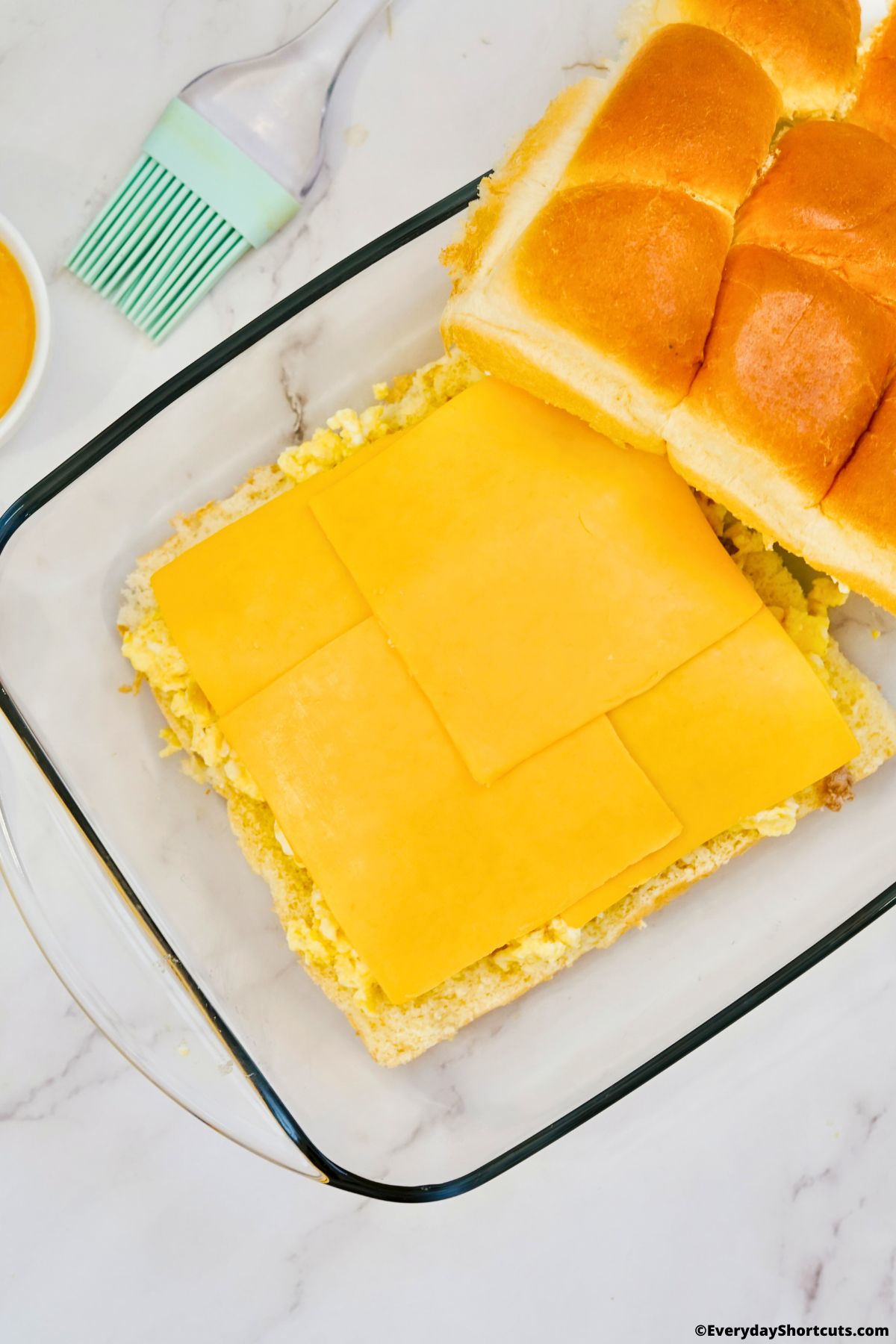 scrambled eggs and cheese on buns