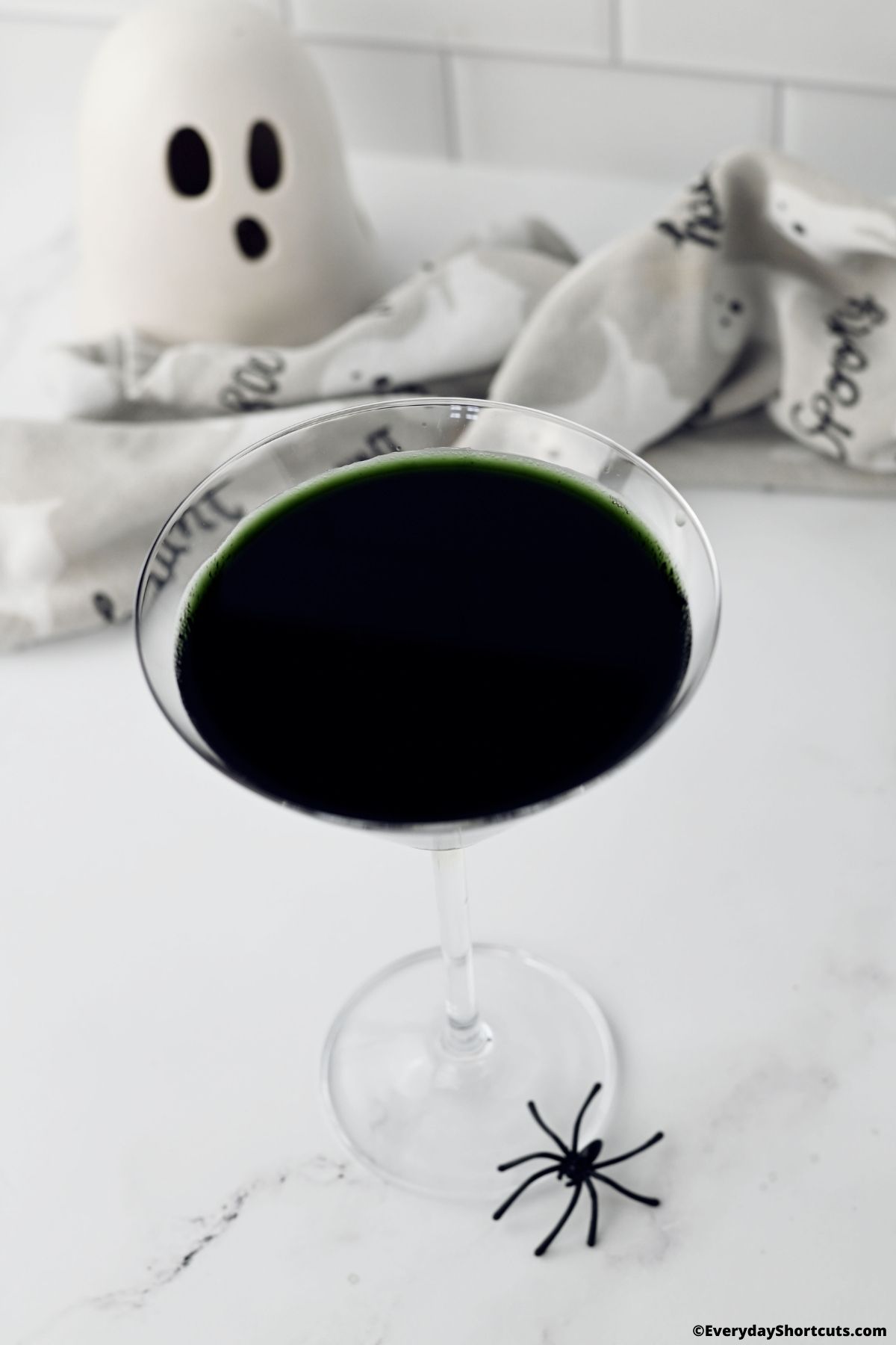 Halloween black vodka martini