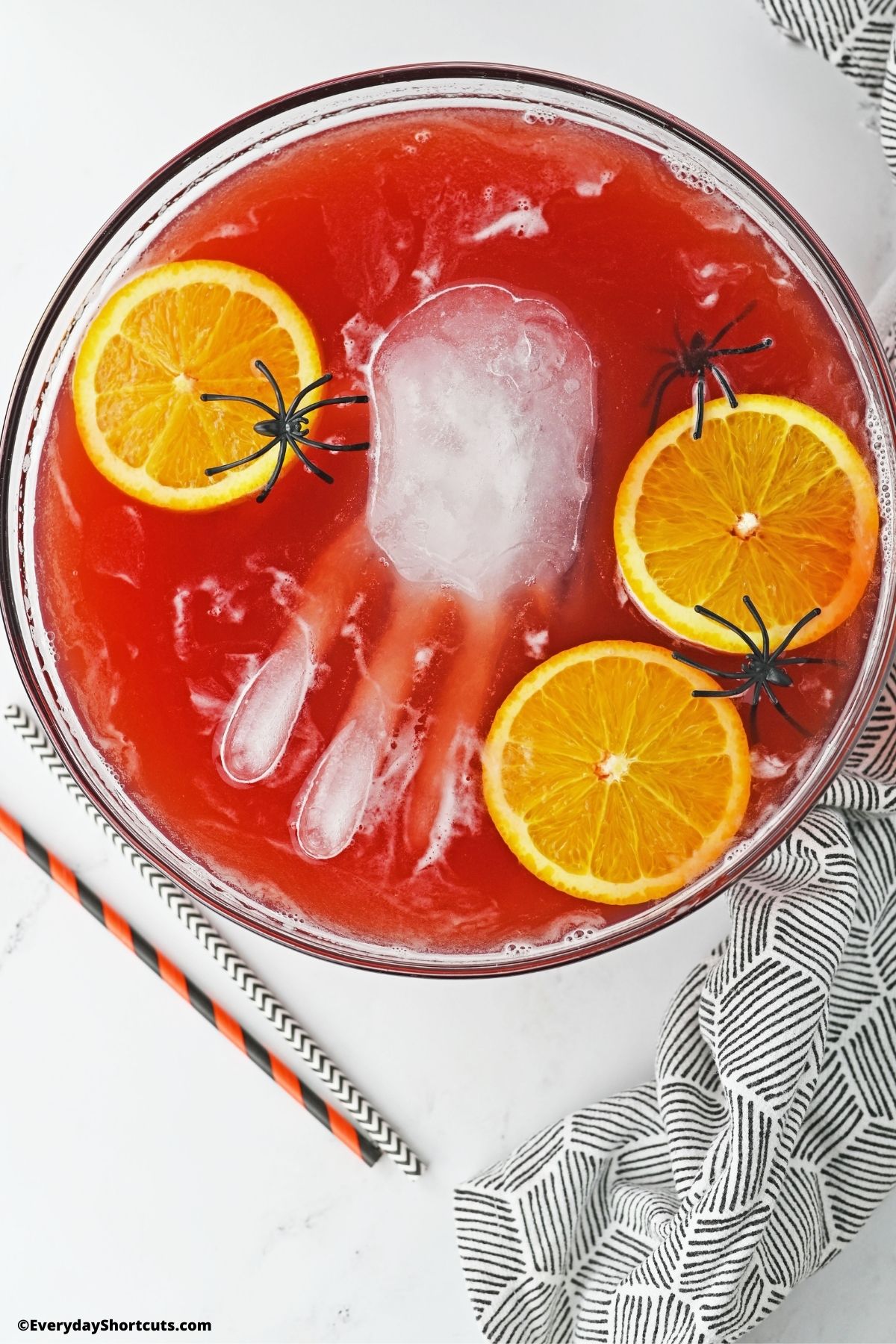 spooky Halloween punch with ice hand in punch bowl