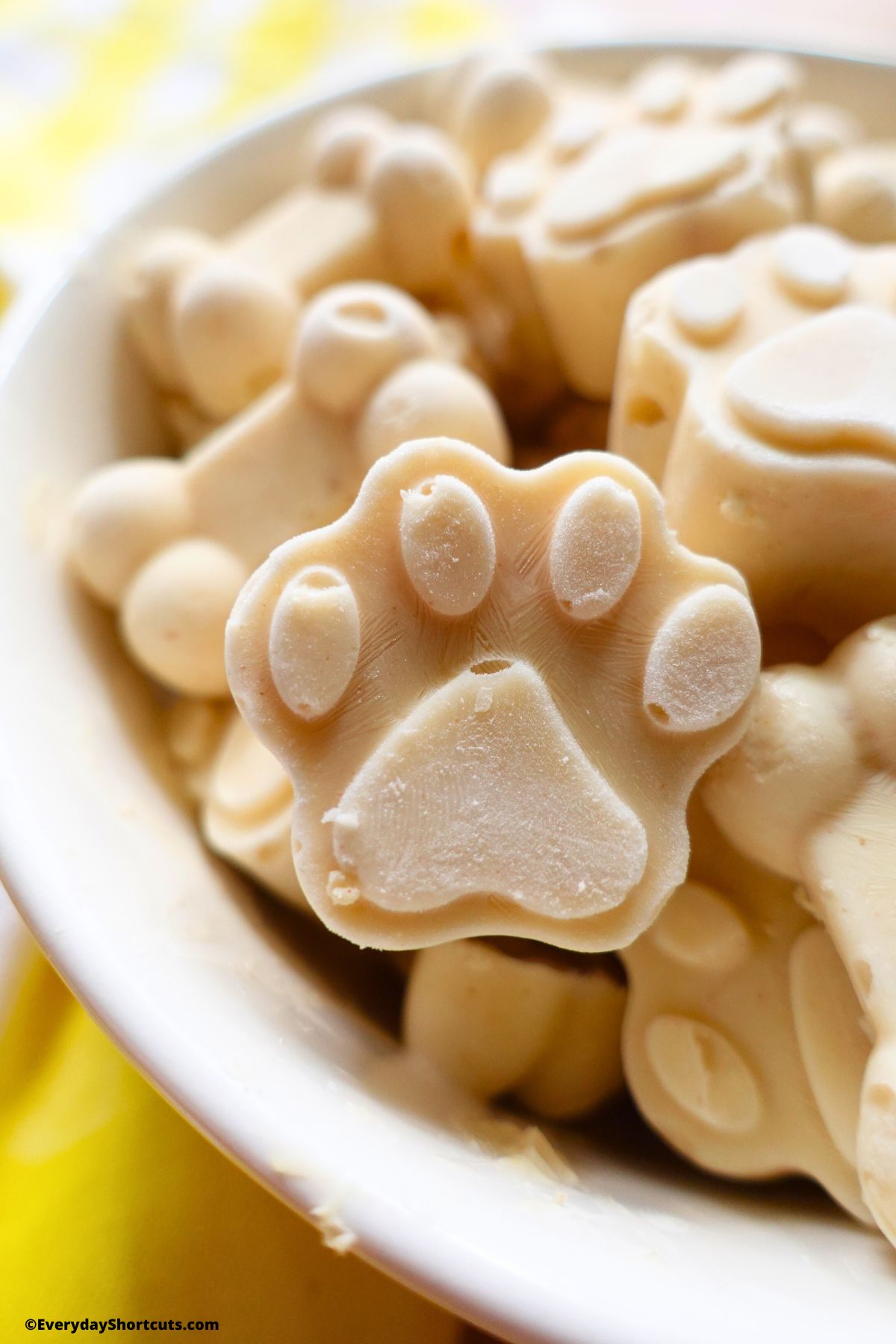 paw shaped dog ice cream treats in a bowl