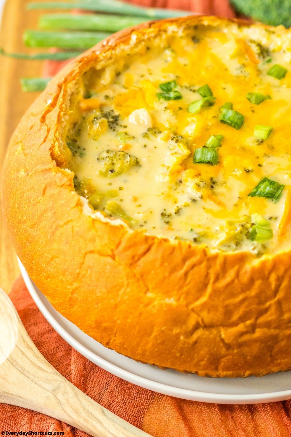 broccoli and cheese soup in a bread bowl