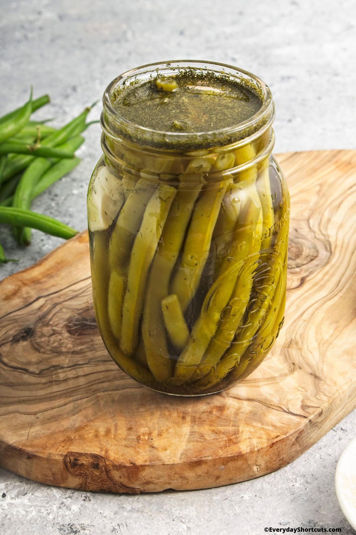 pickled green beans in a mason jar