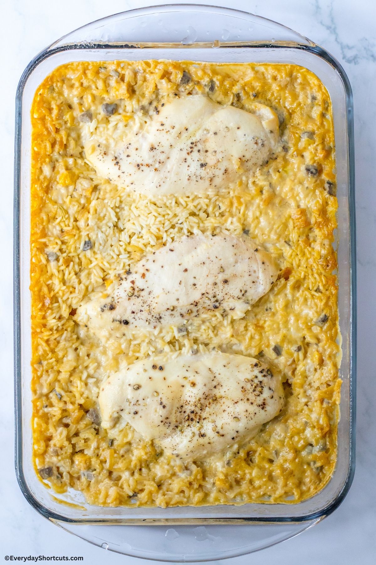 baked chicken and rice in a casserole dish