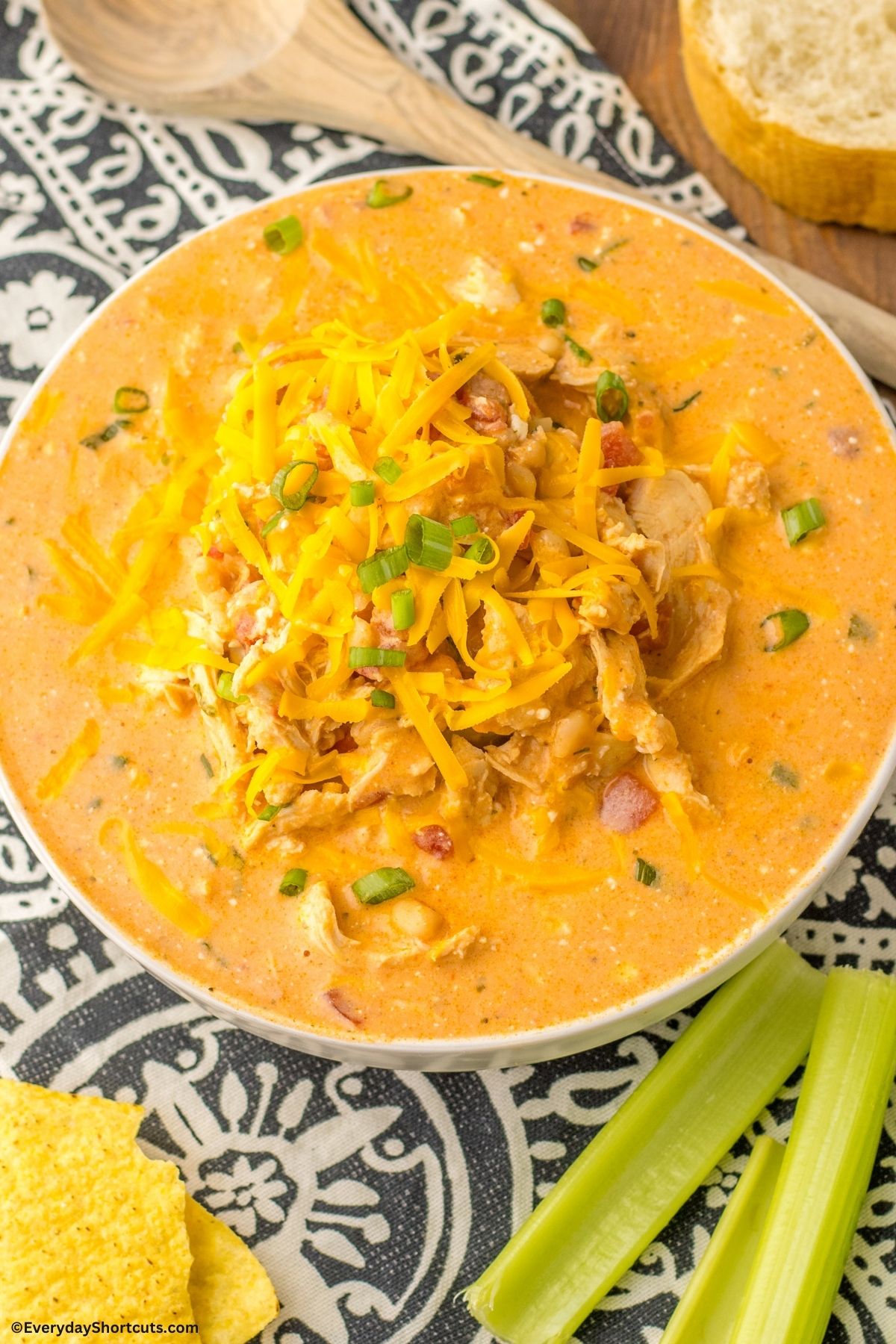 buffalo chicken chili in a bowl with cheese