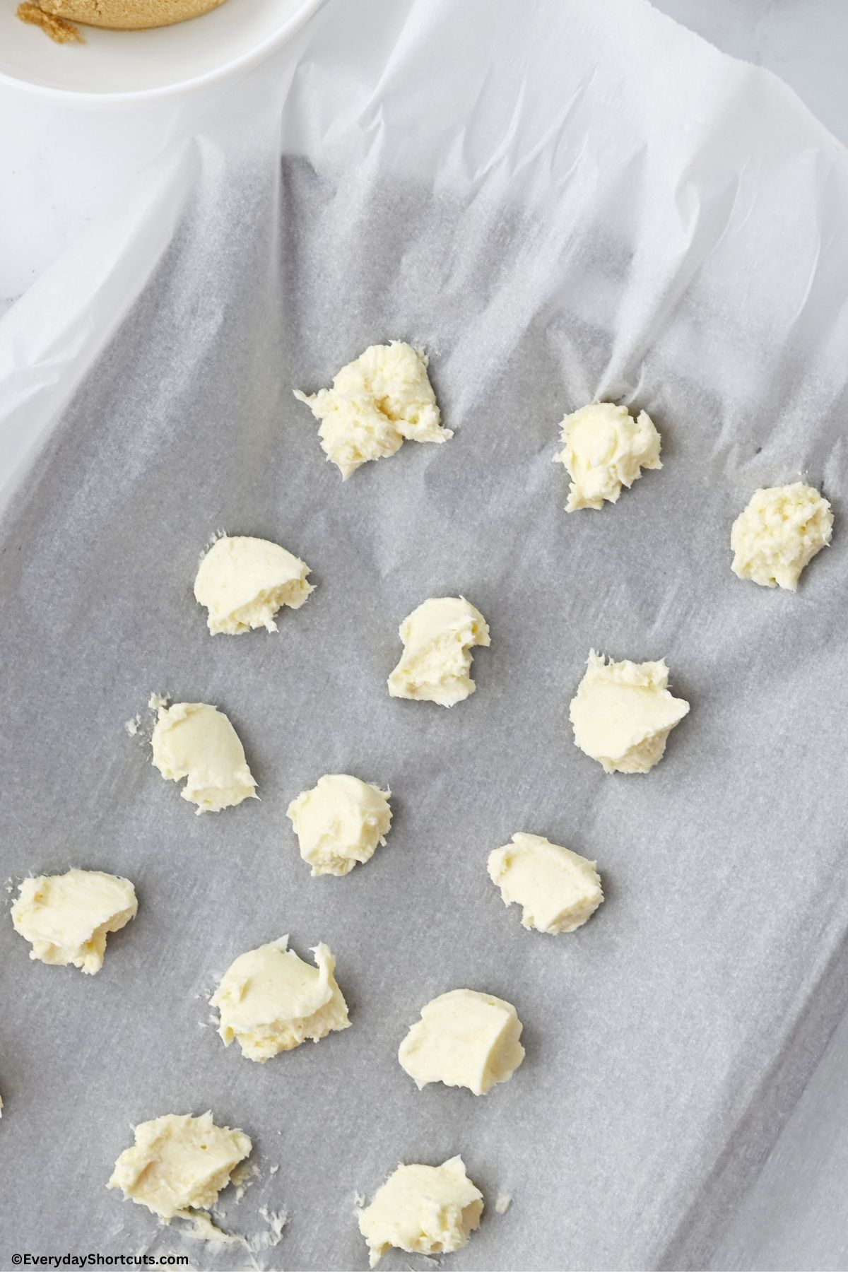 cheesecake drops on parchment paper