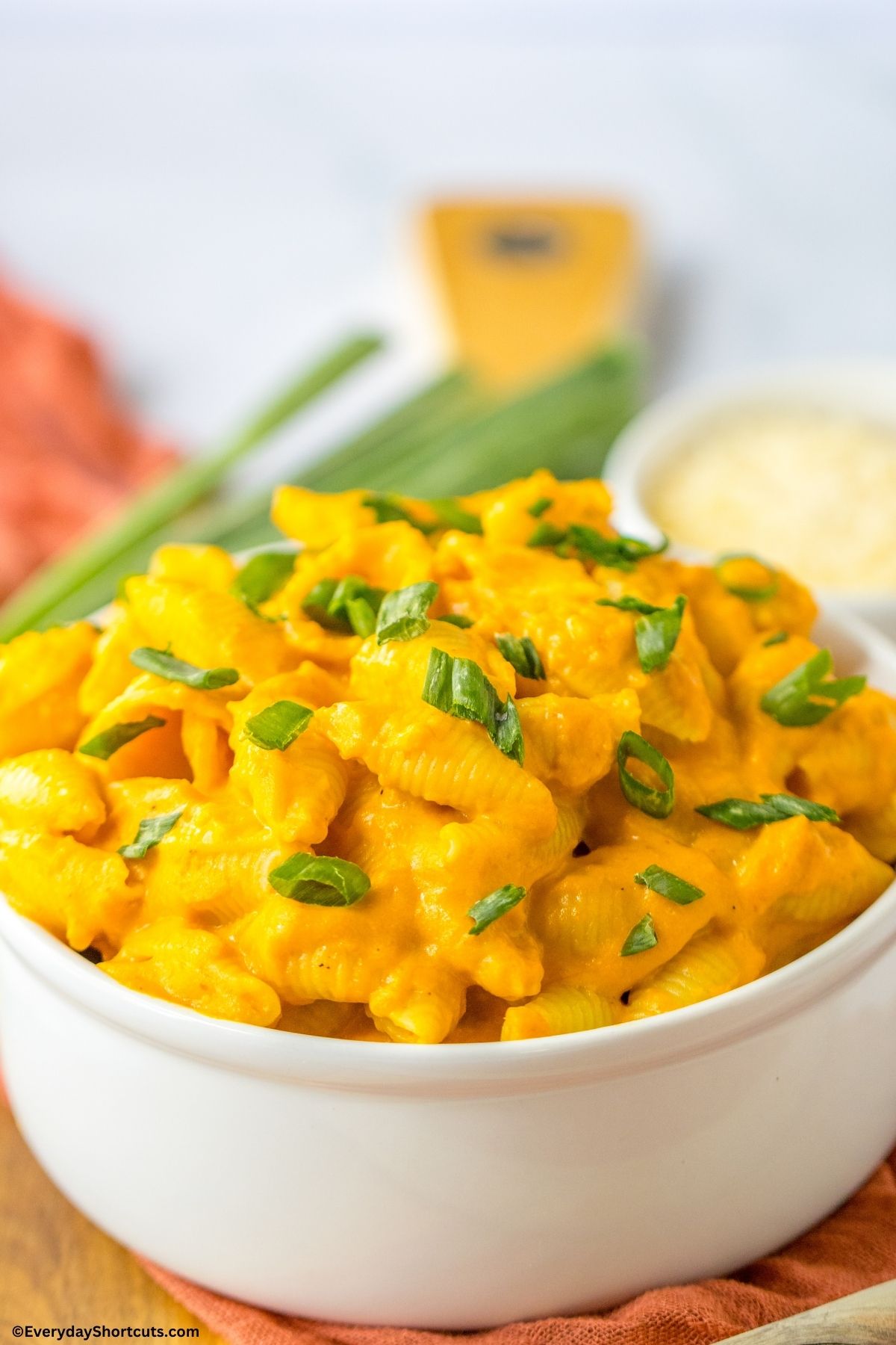 bowl of mac and cheese with pumpkin sauce