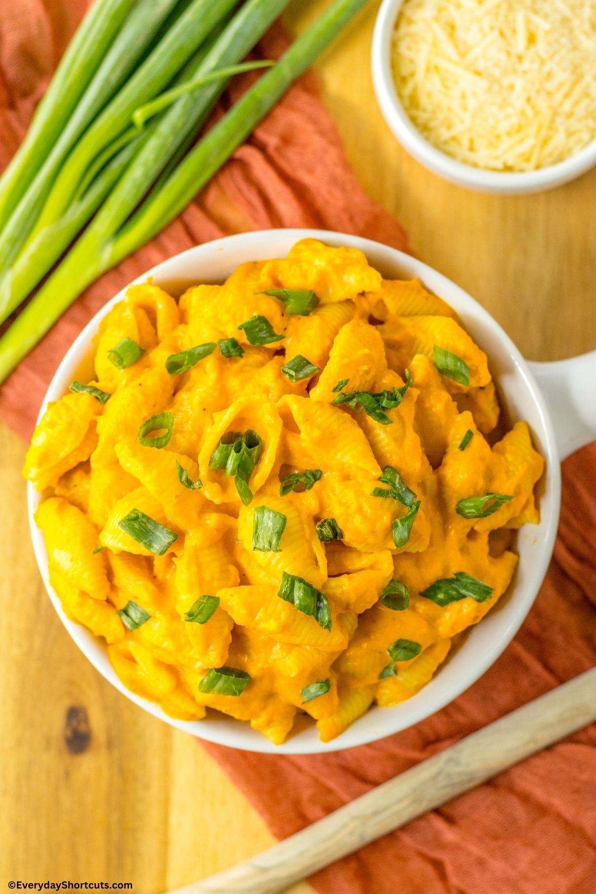 pasta with pumpkin cheese sauce in a bowl
