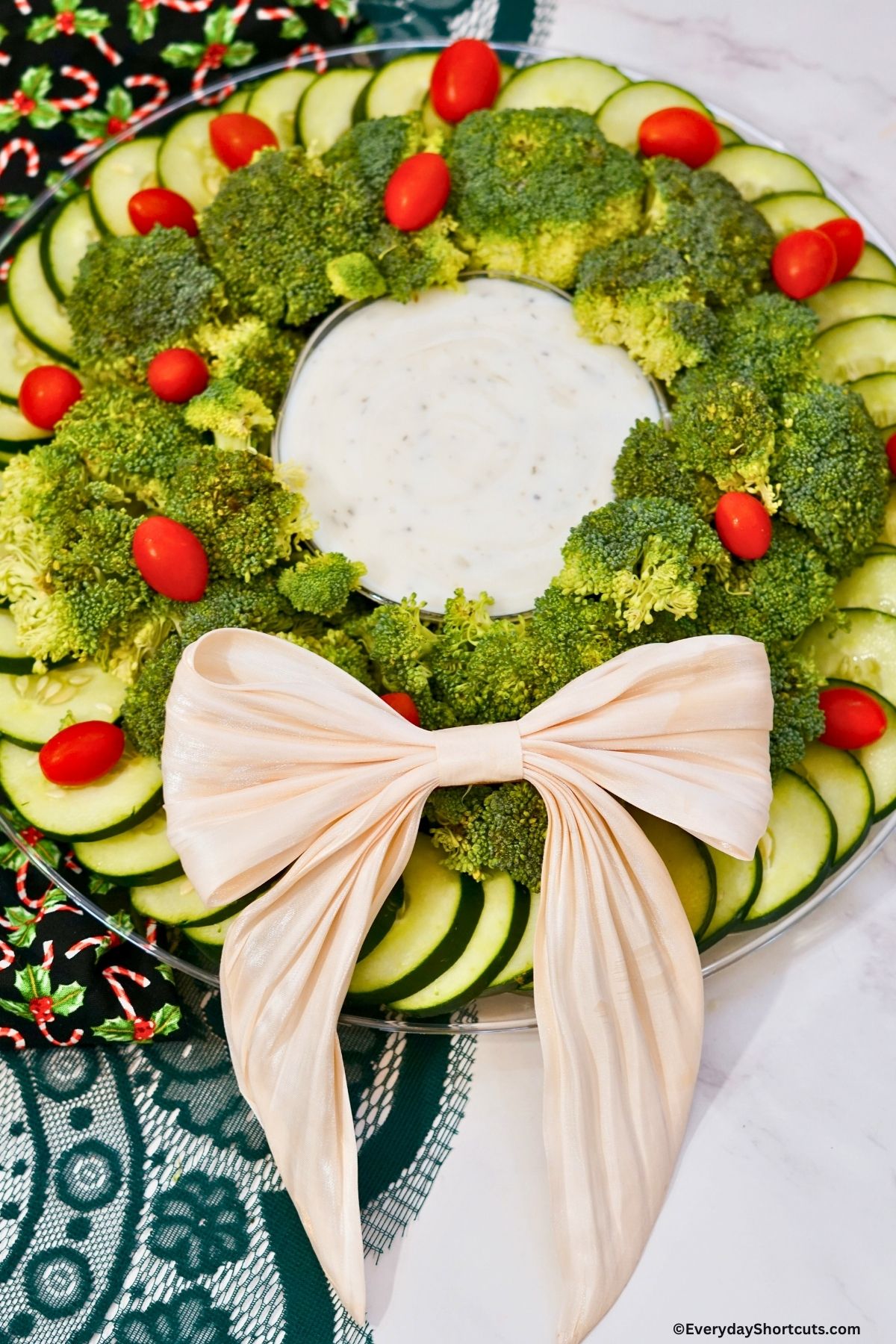 veggie tray with broccoli cucumbers and tomatoes