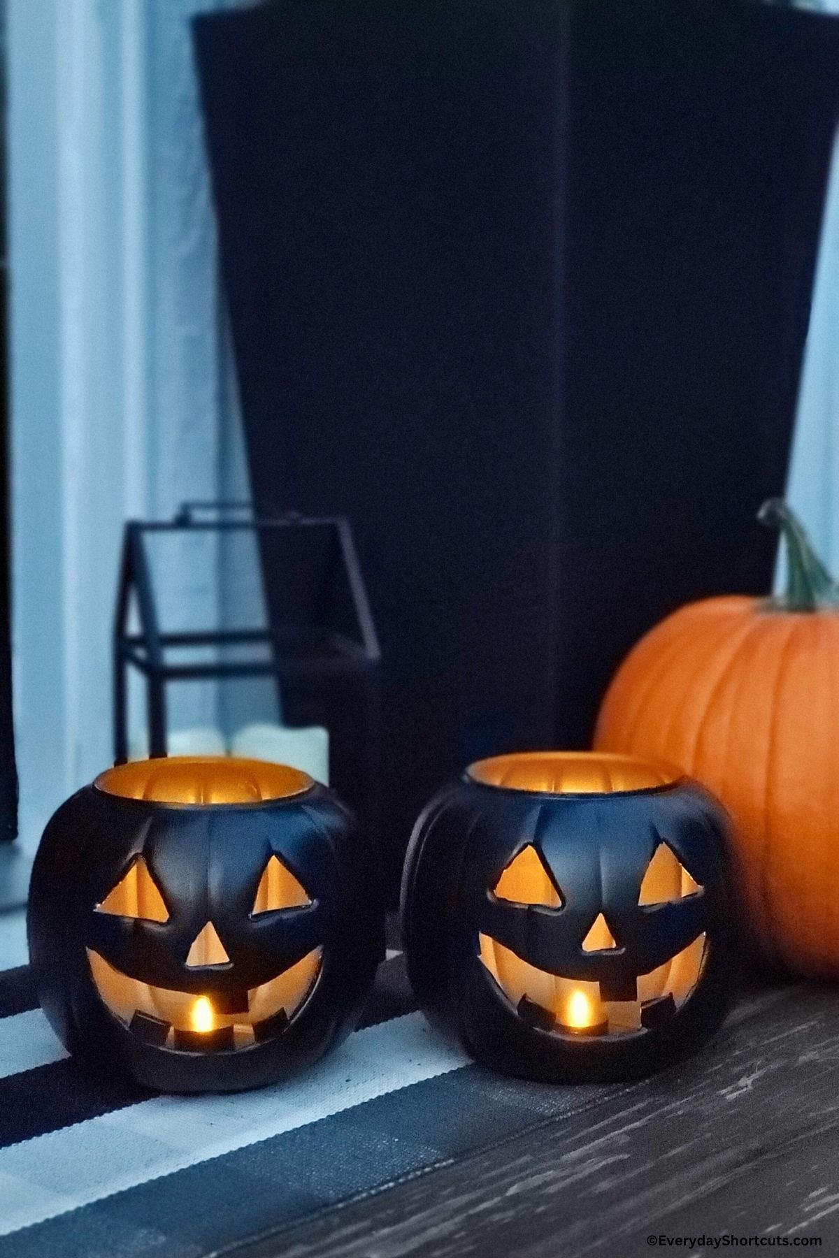 black and gold Jack-O-Lantern candle holders