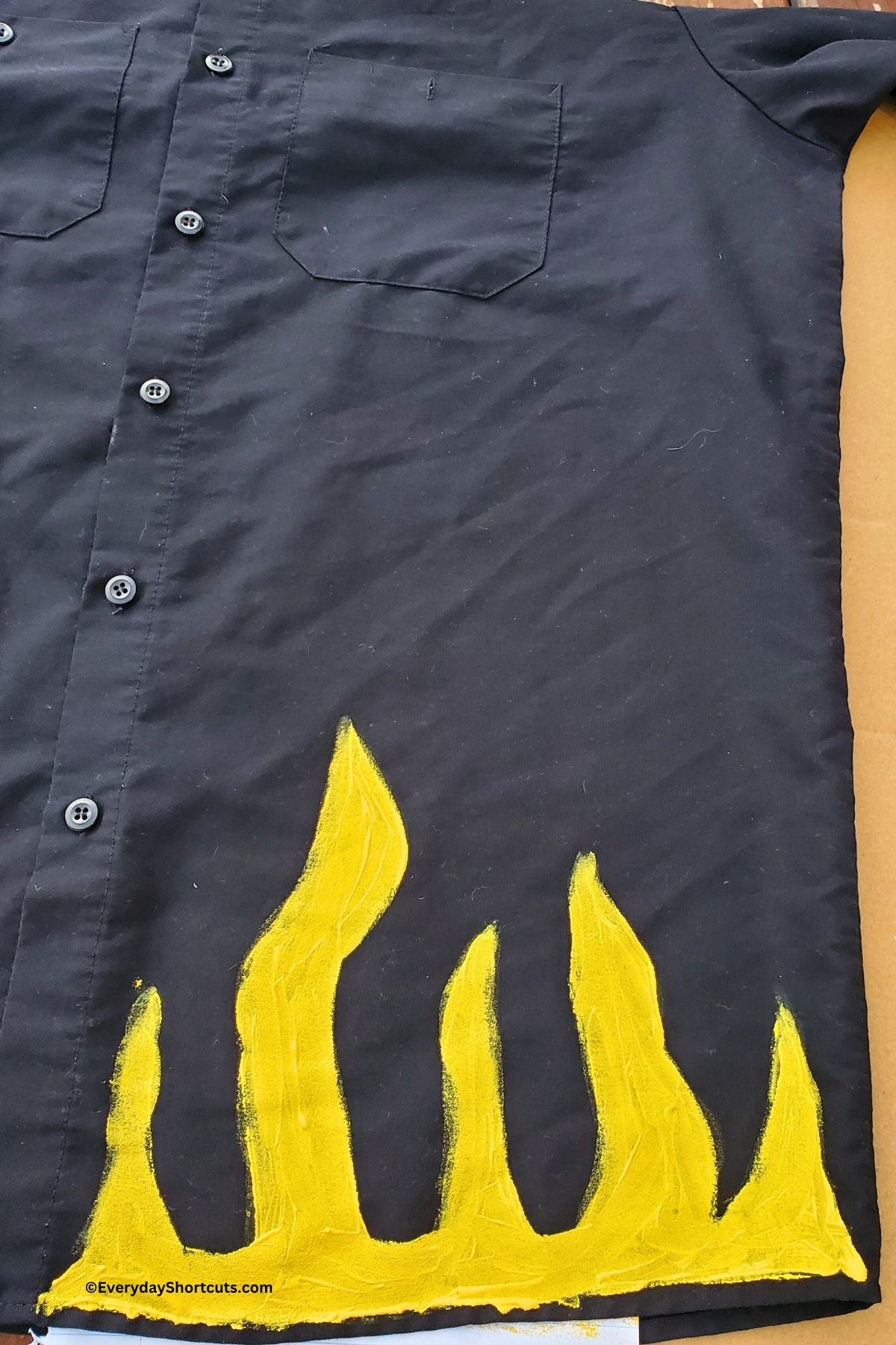 painting flames on a black shirt