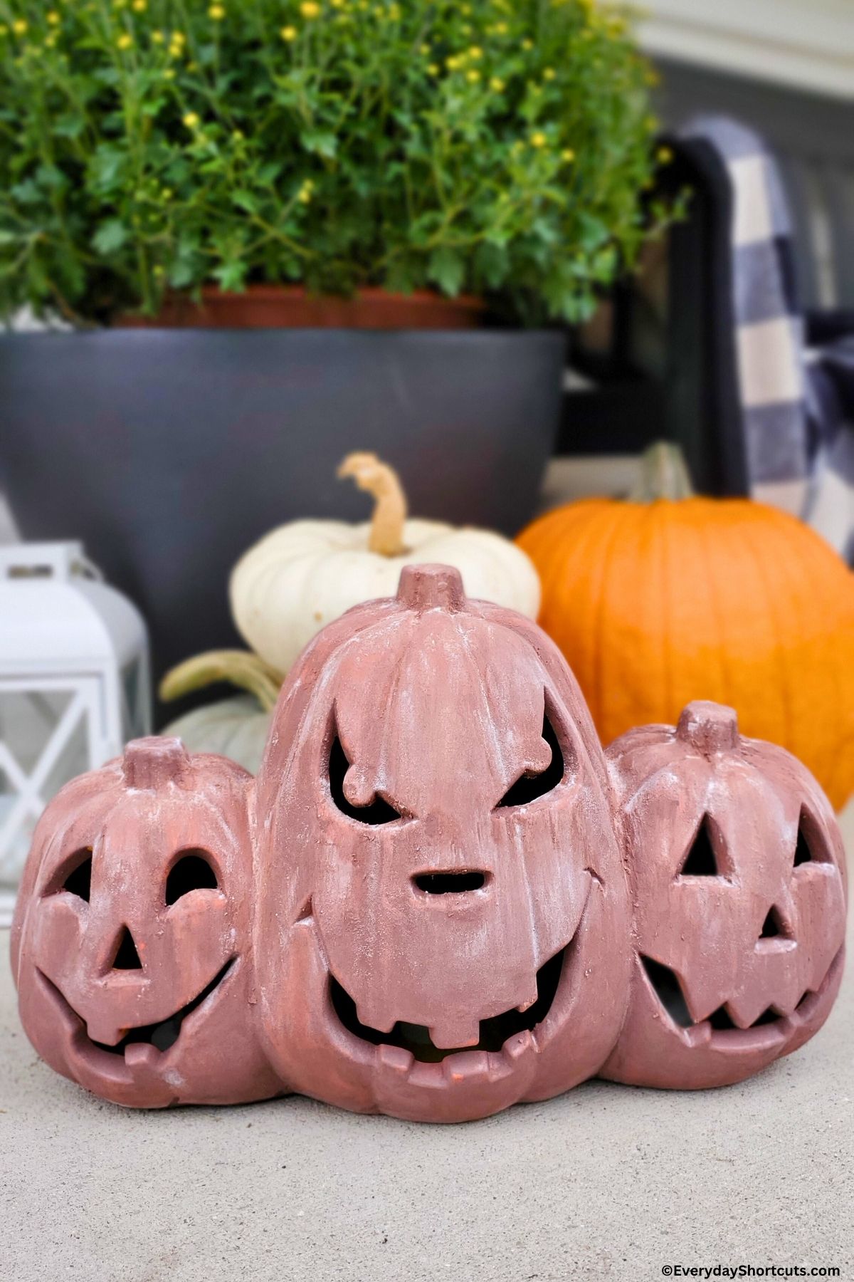 diy terracotta pumpkins on a porch