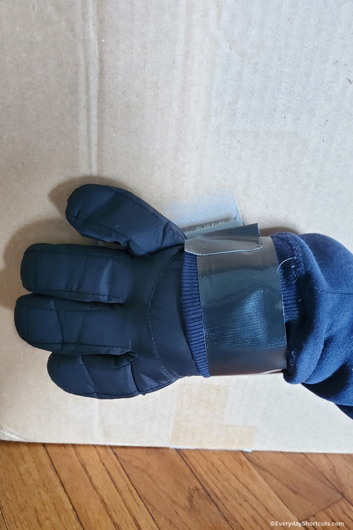 duct taped gloves to box