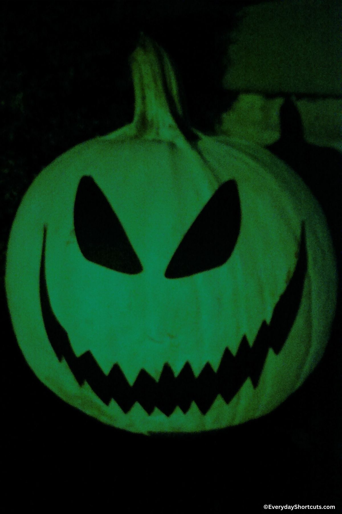 spray painted pumpkin with glow in the dark spray paint