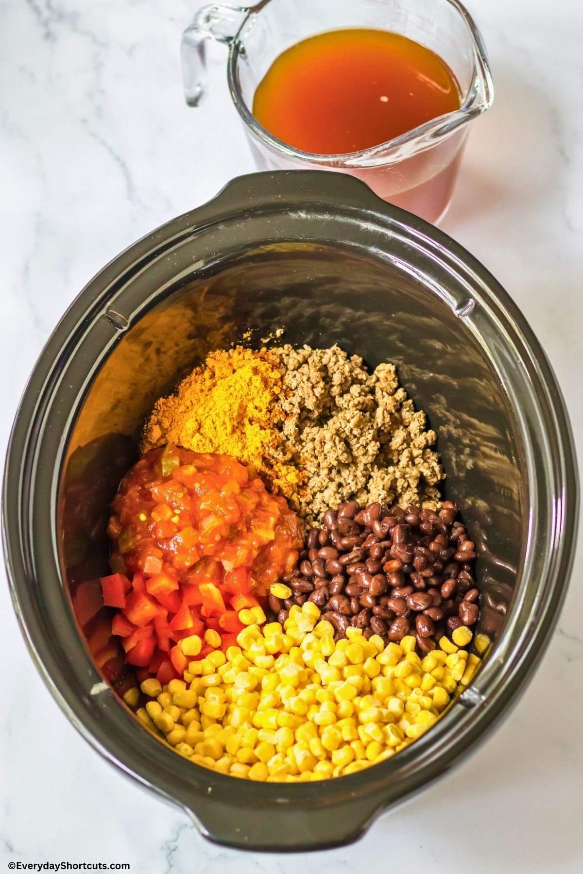 taco pasta ingredients in a crock pot