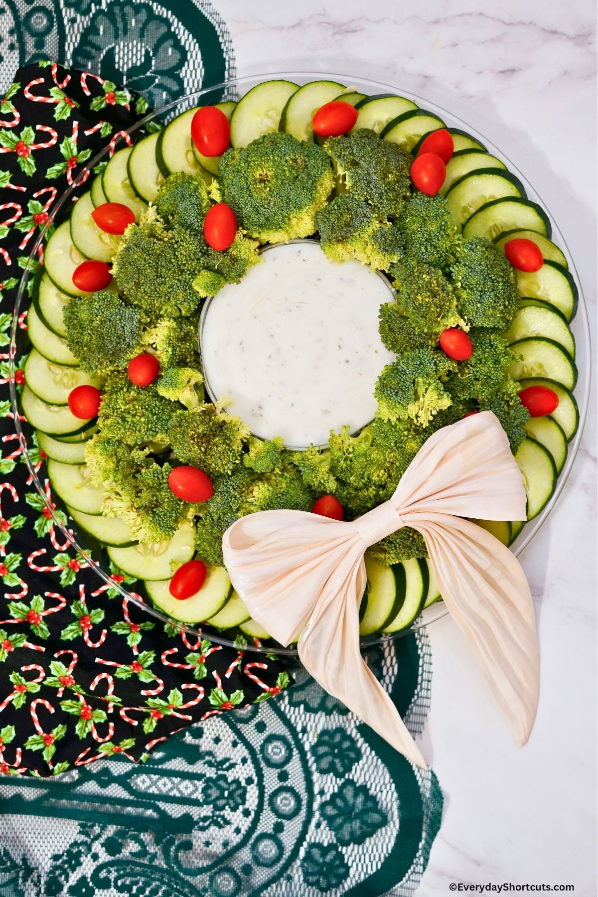 Christmas wreath veggie tray with dip and a bow