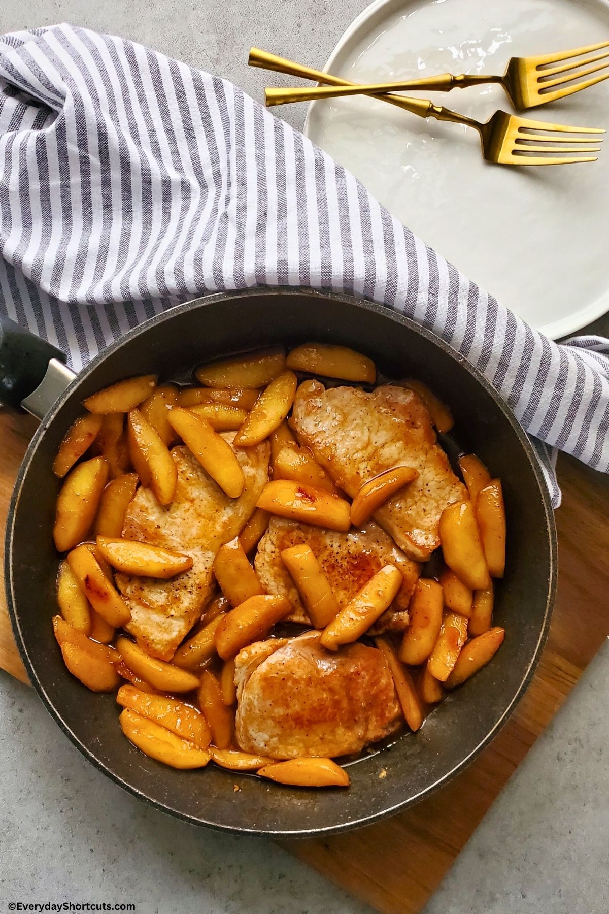 apple cinnamon pork chops in a skillet