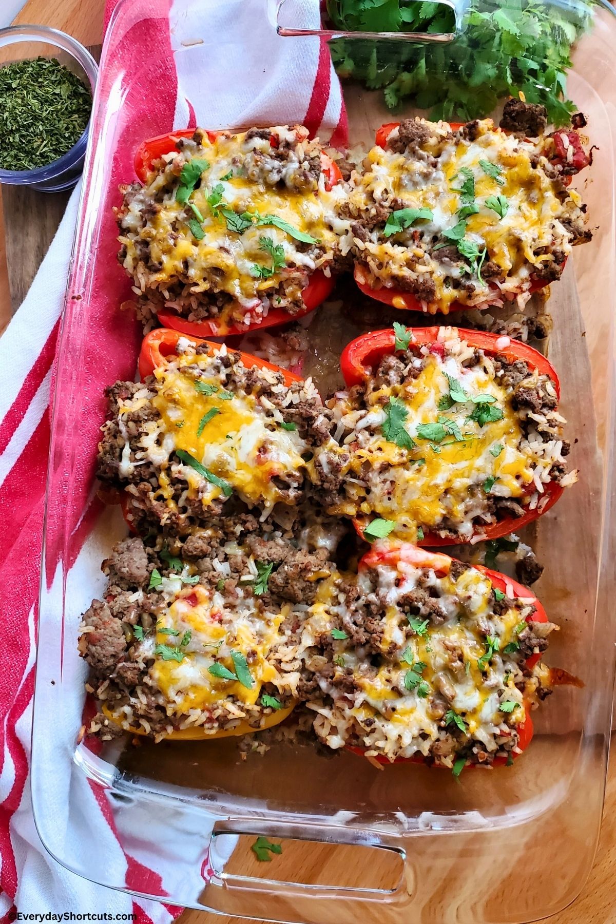 stuffed peppers with rice in a baking dish