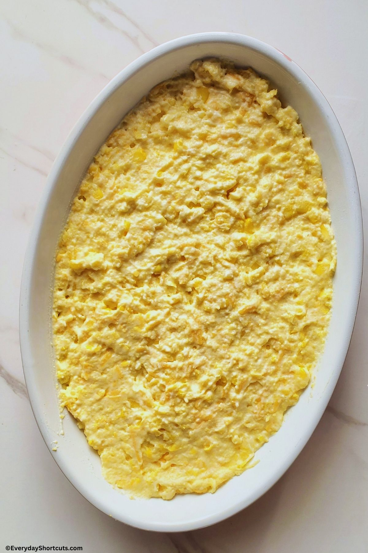 corn cheese cornbread mix spread evenly in a baking dish