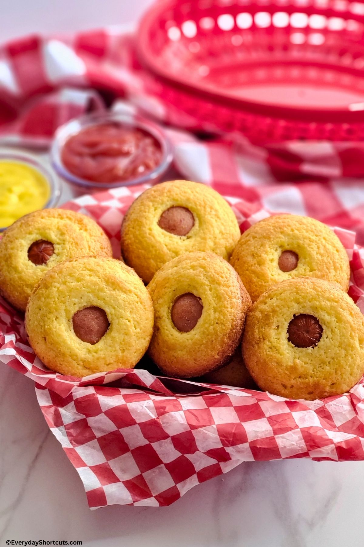 mini corn dog muffins in a basket