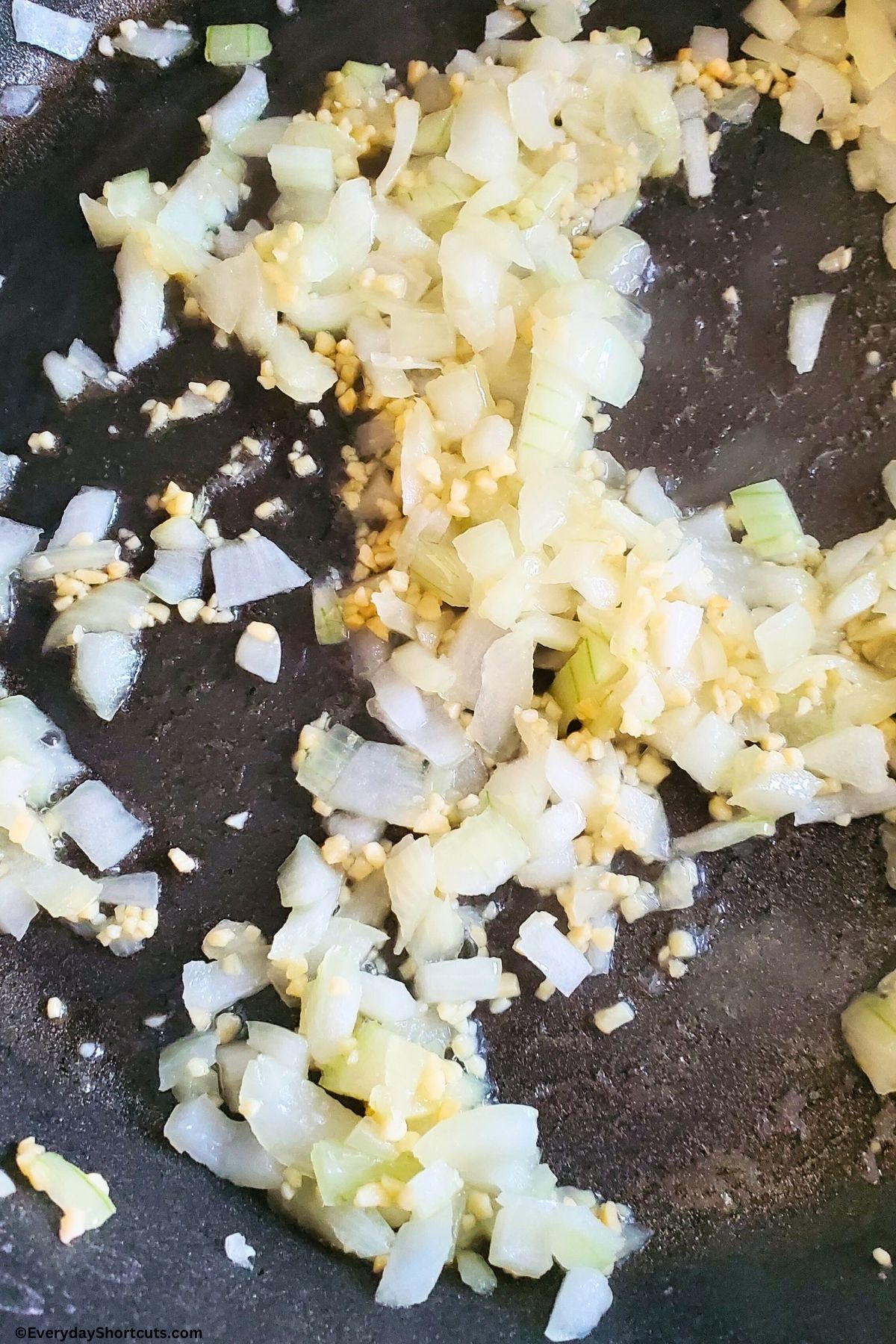 onions and minced garlic sauteed in a pan