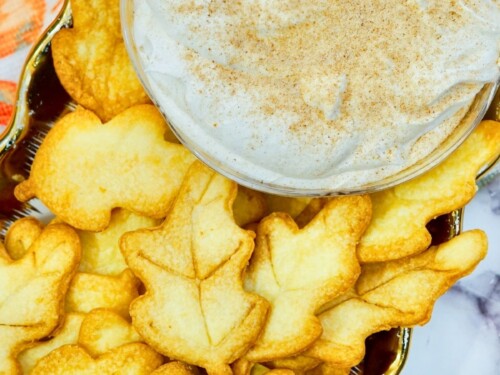 https://everydayshortcuts.com/wp-content/uploads/2023/11/pie-crust-cookies-on-a-platter-with-cinnamon-dip-500x375.jpg