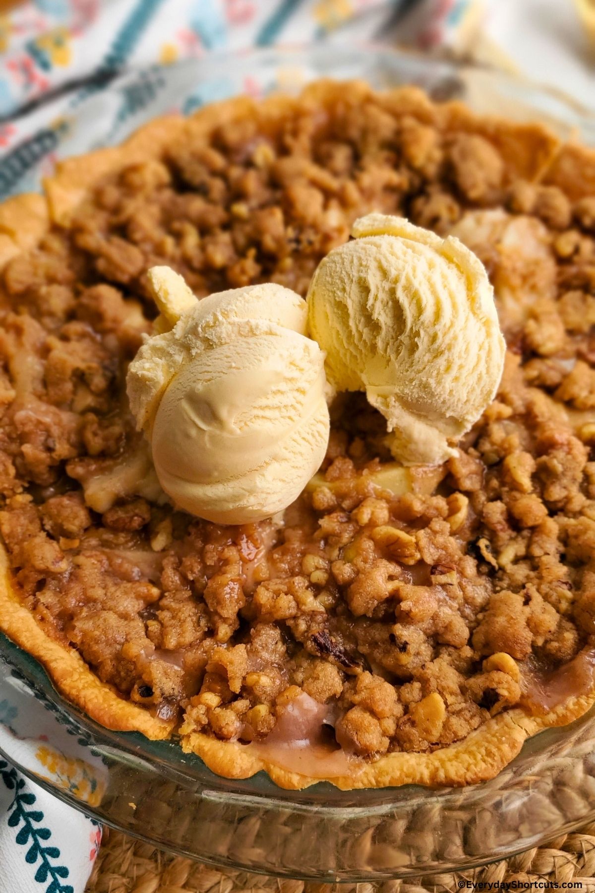 sour cream apple walnut pie with ice cream on top