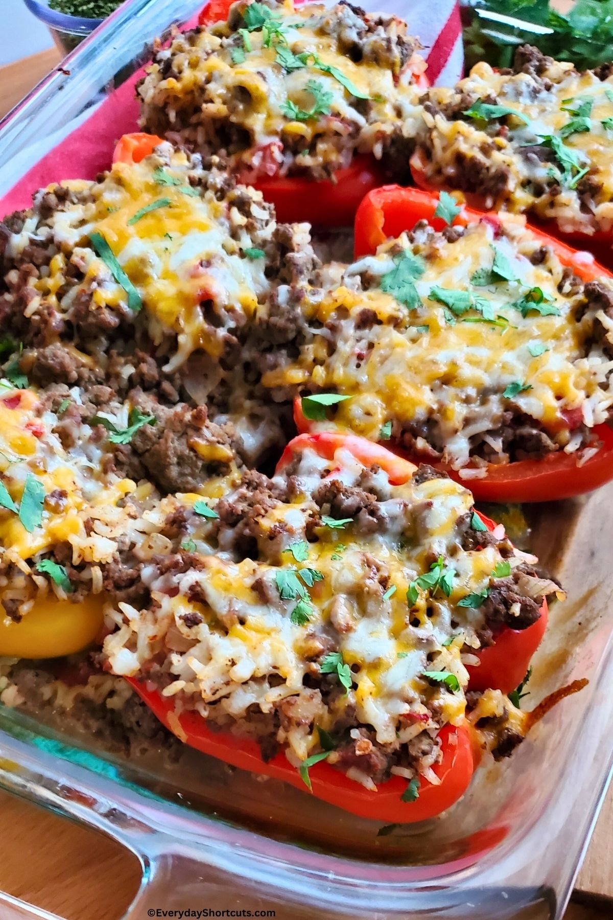 stuffed bell peppers in a baking dish
