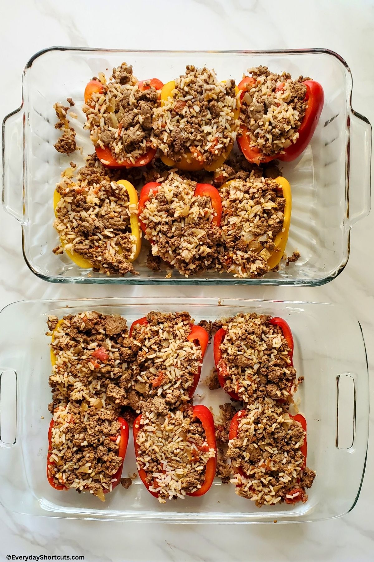 meat mixture with tomatoes and rice stuffed in bell peppers