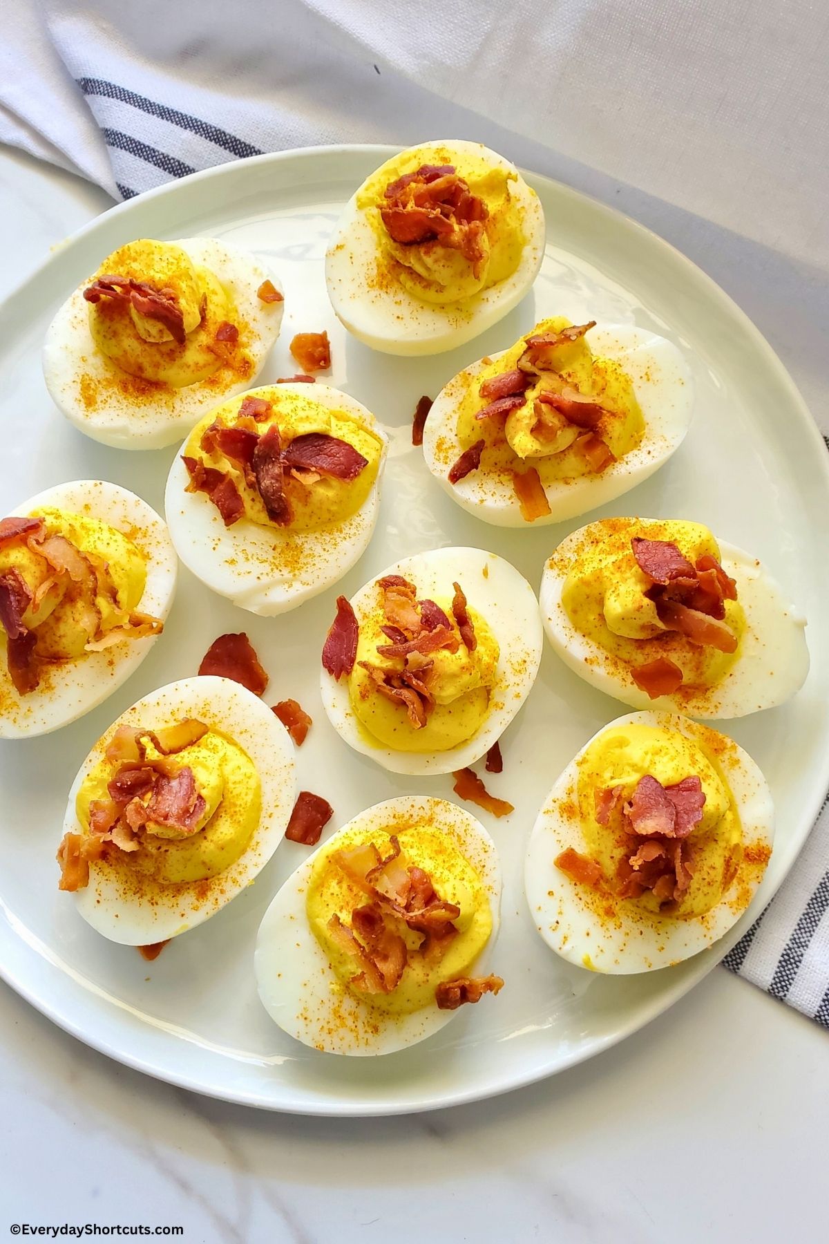bacon deviled eggs on a plate