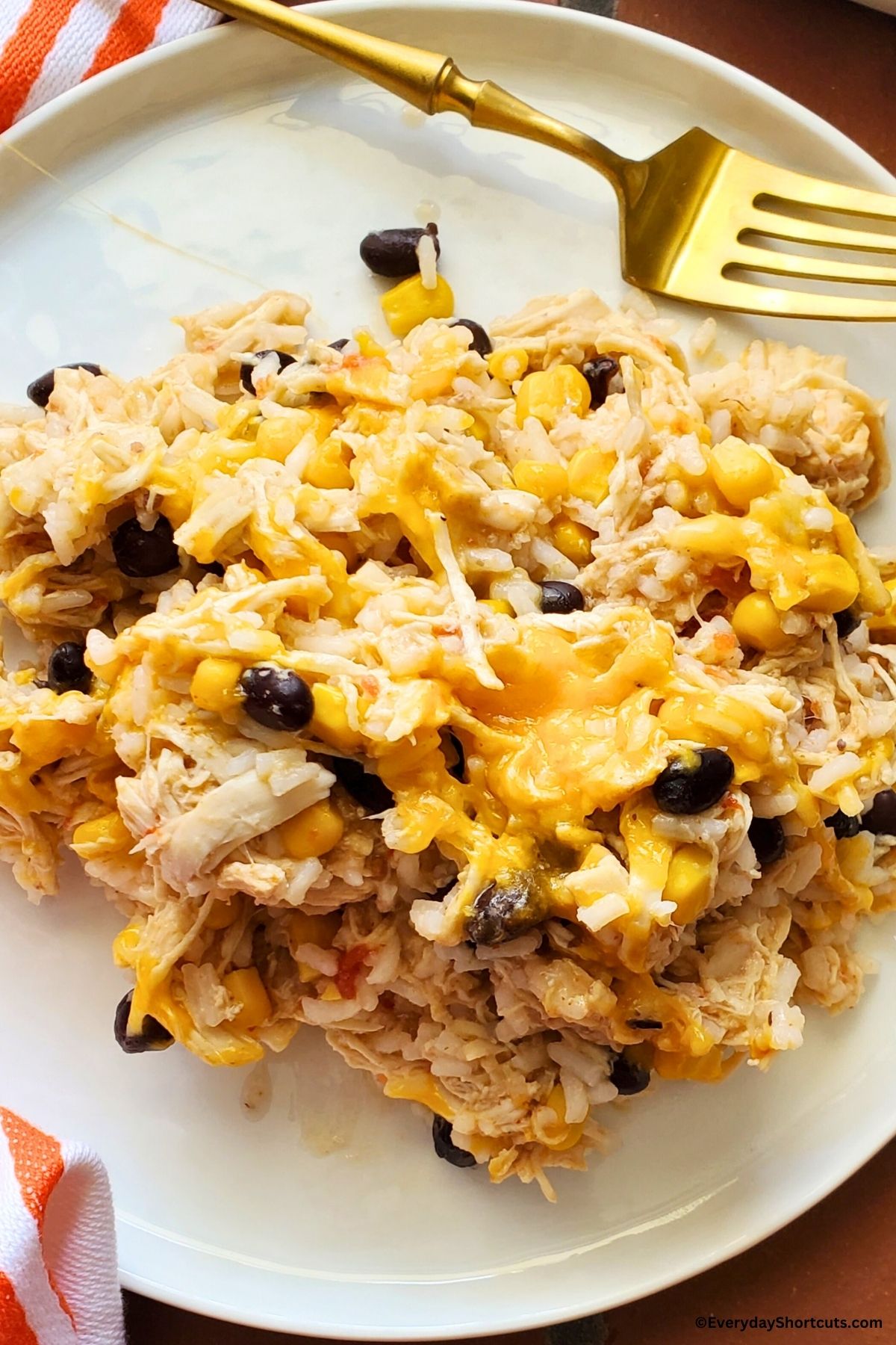 cheesy chicken and rice on a plate