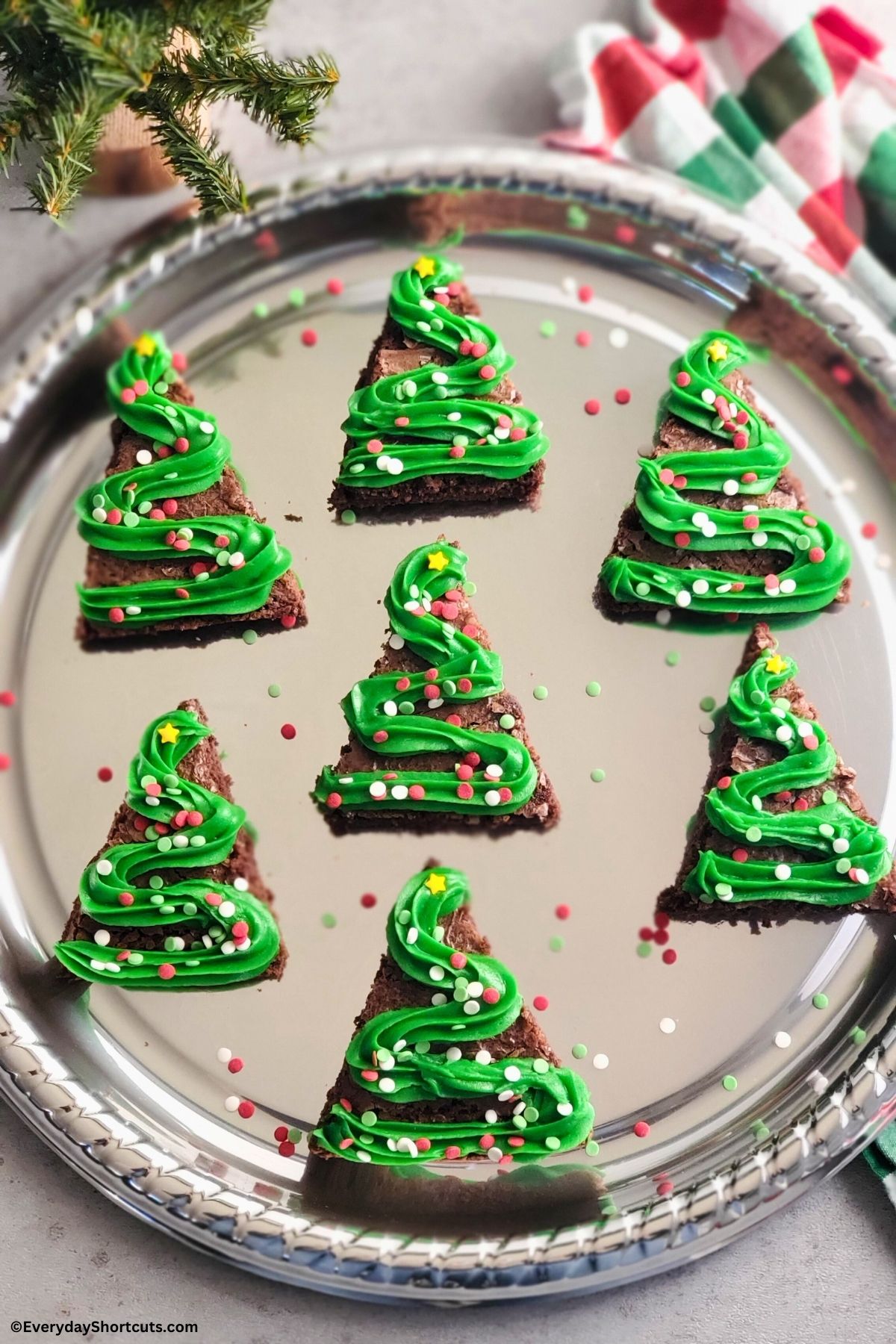 Christmas tree brownies on a silver platter