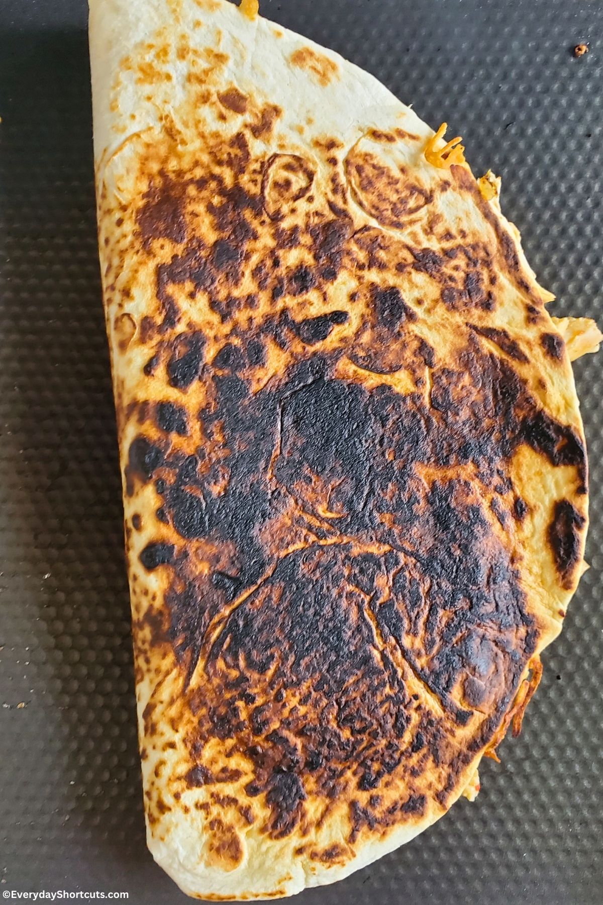 grilled tortilla in a skillet
