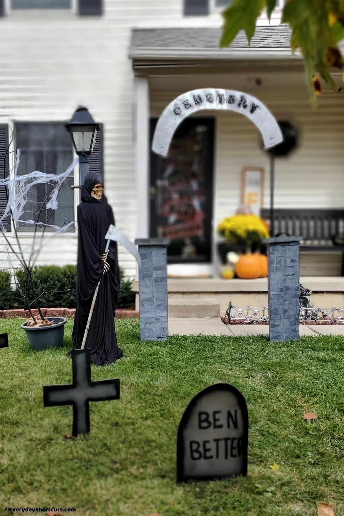 grim reaper in haunted yard cemetery