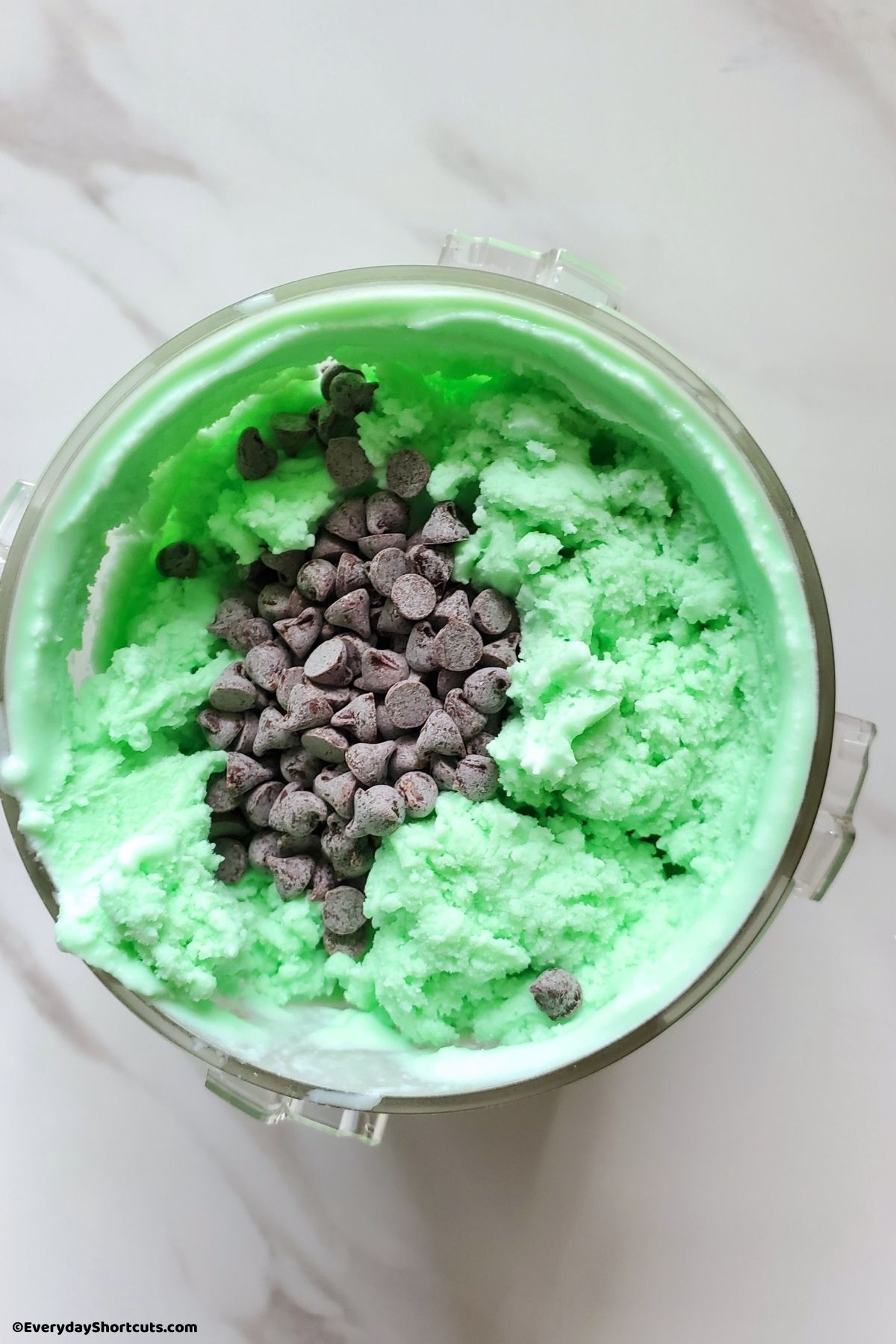 chocolate chips mixed in mint ice cream