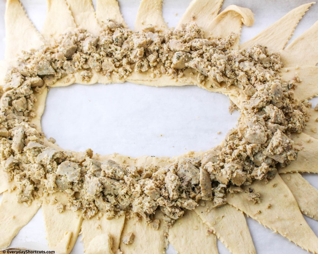 crumbled boudin sausage inside crescent roll ring